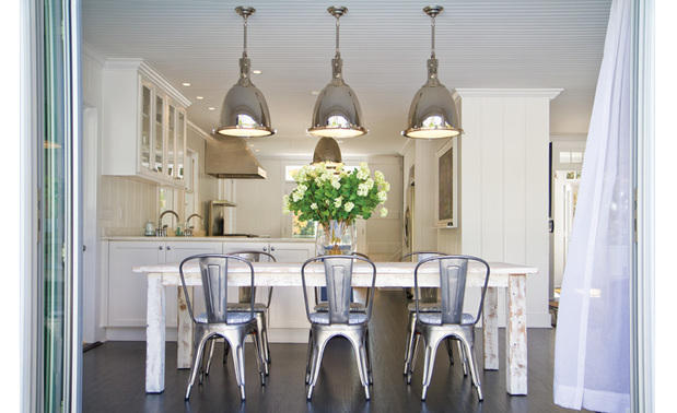 Modern Dining Room with glass front cabinets