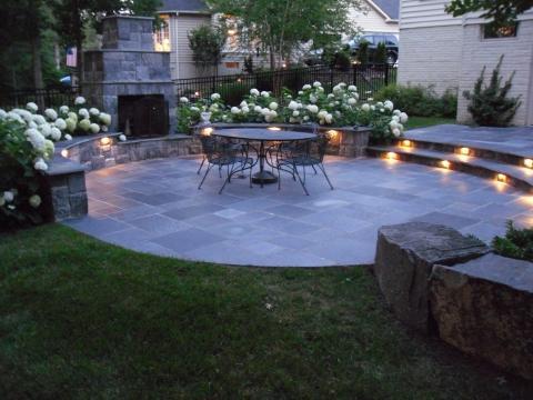 Traditional Patio with wrought iron fire place screen