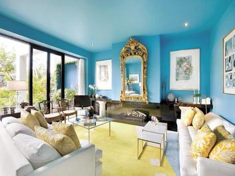 Eclectic Family Room with black granite on wall around fire place