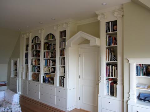 Traditional Library with white cabinet book case