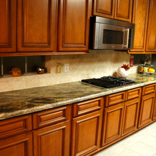 Transitional Library with diamond pattern ceramic tile backsplash