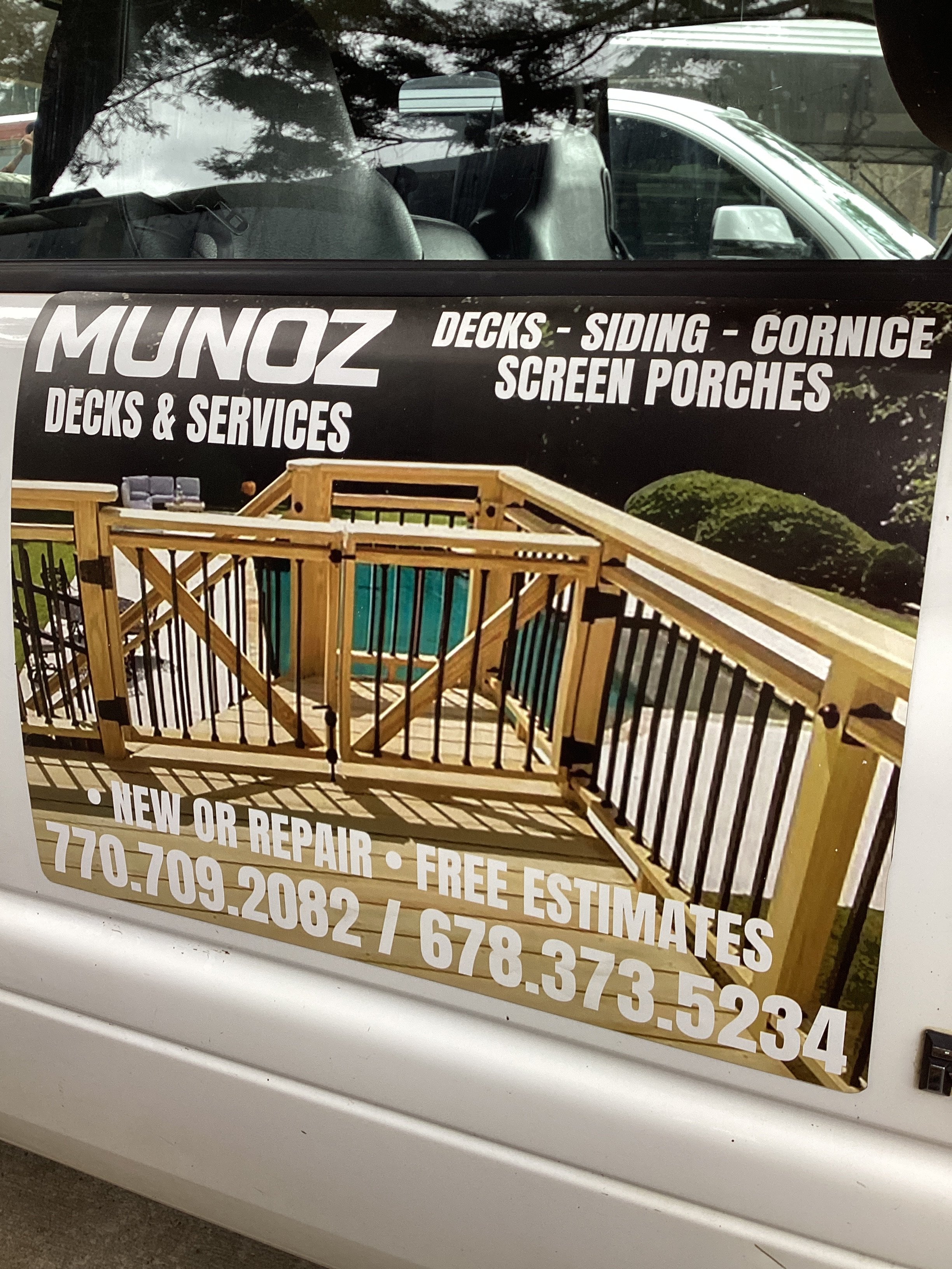 Munoz Decks and Service Logo