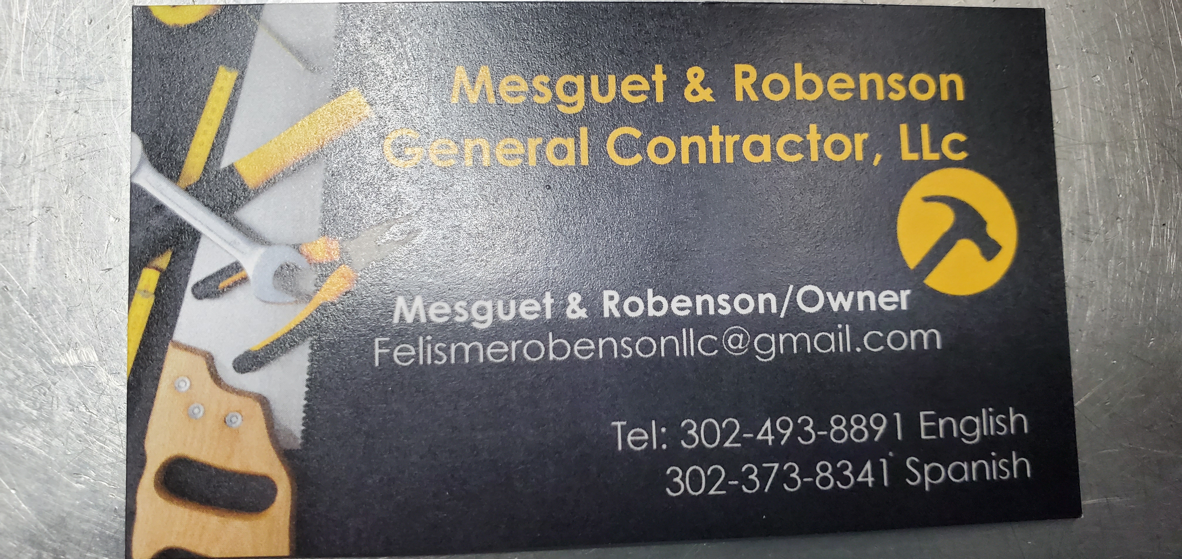 Mesguet AND Robenson General Contractor Logo