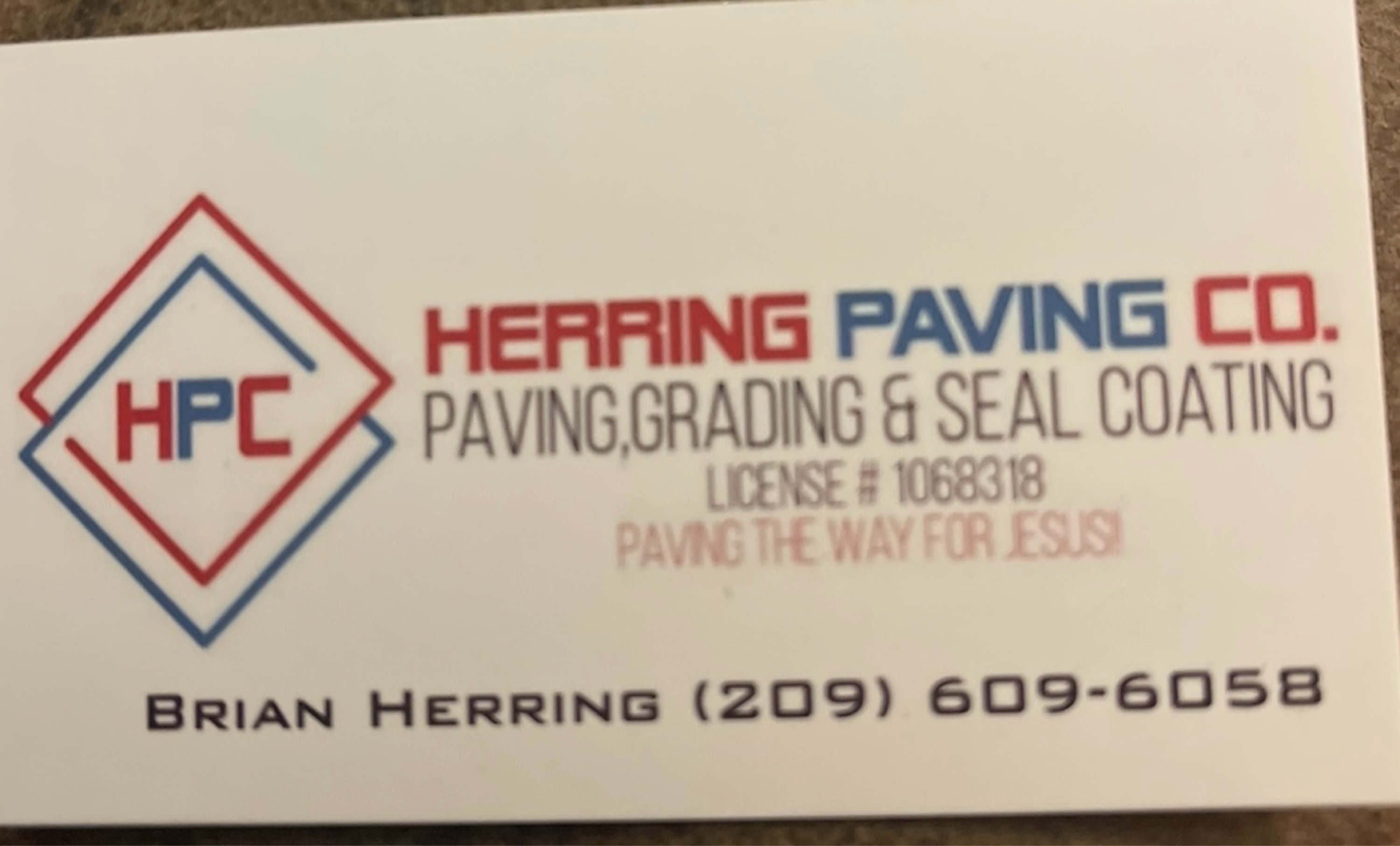 Herring Paving Company Logo