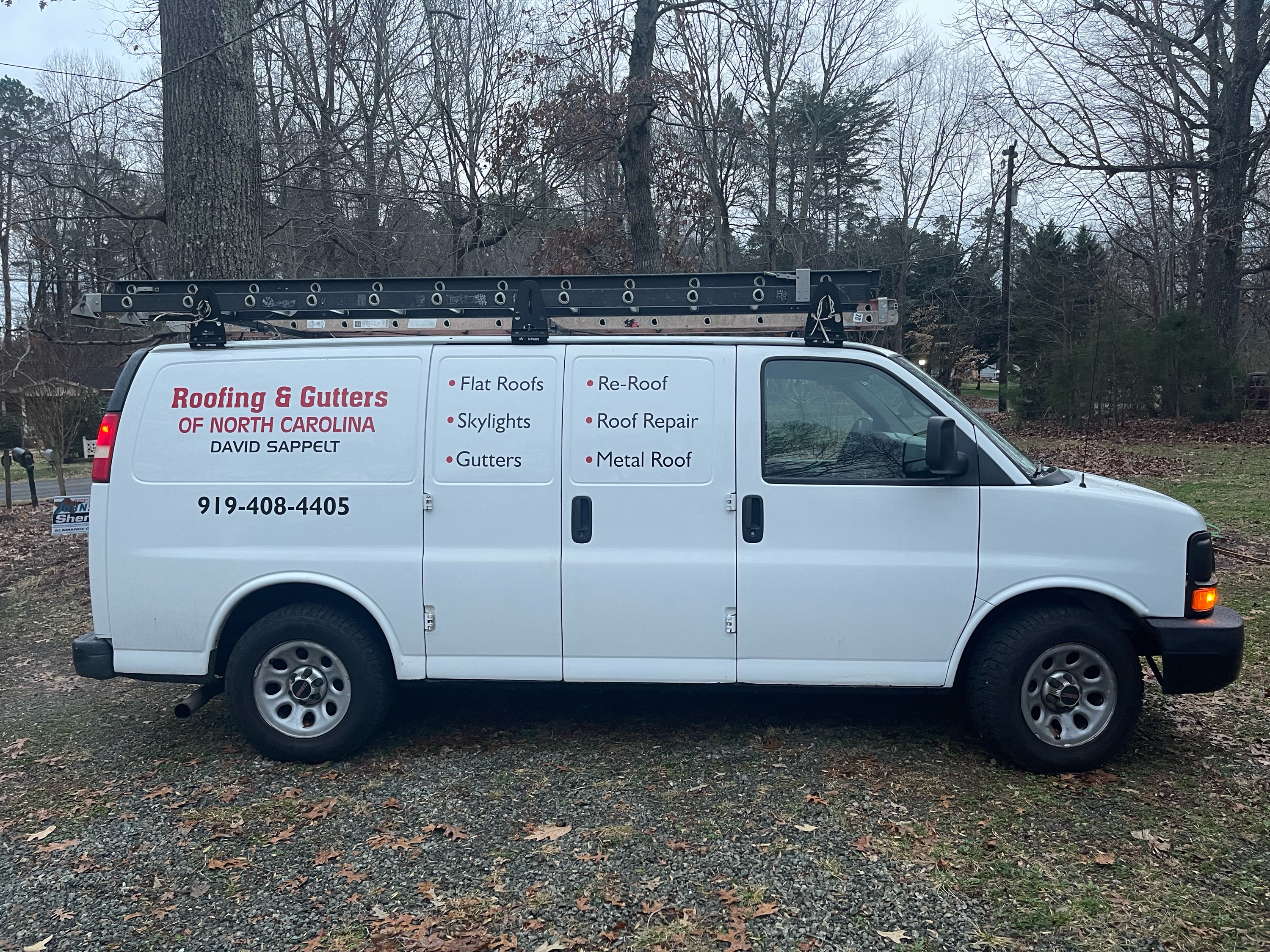 Roofing and Gutters of North Carolina Logo