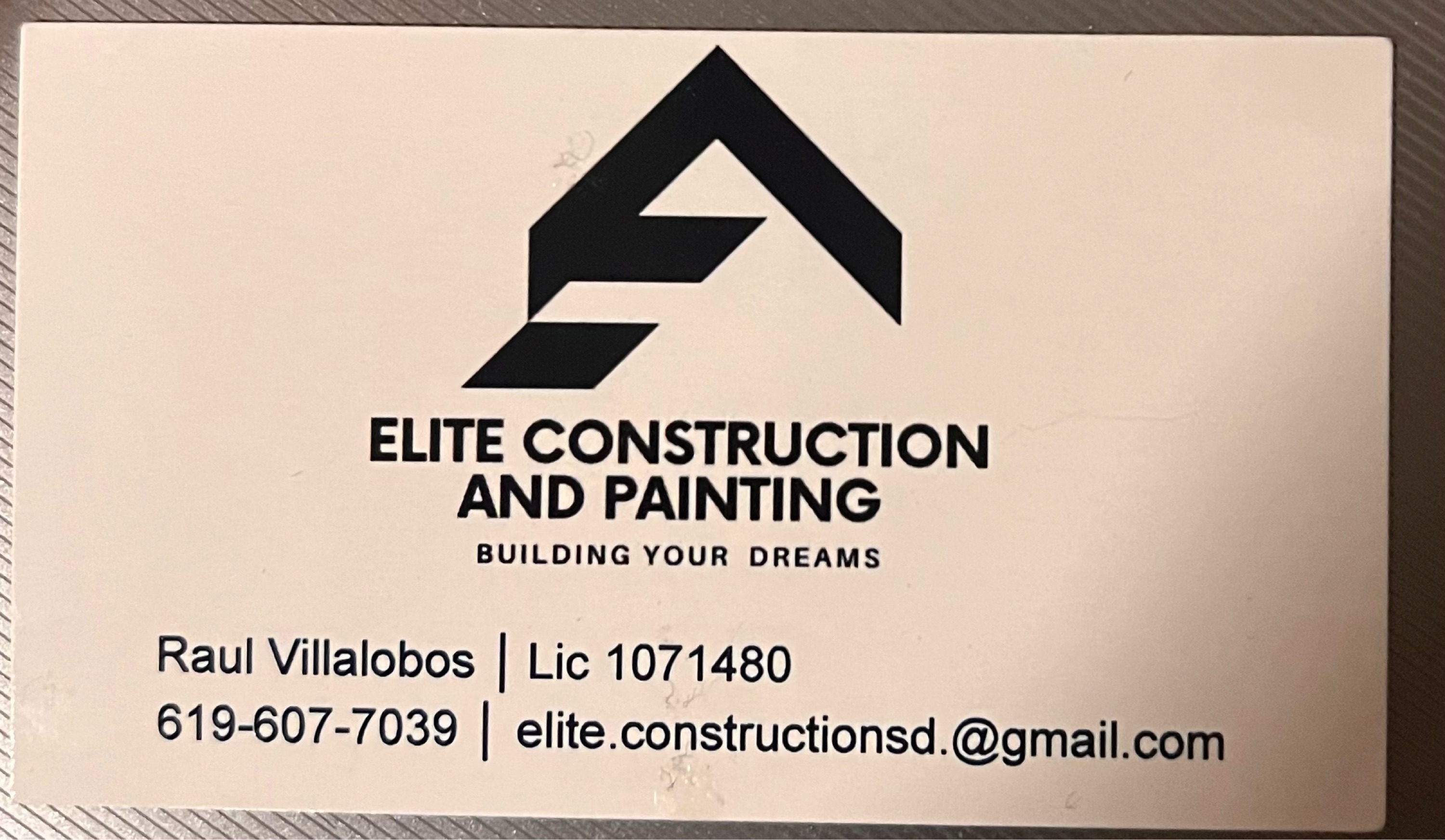 Elite Construction And Painting Logo