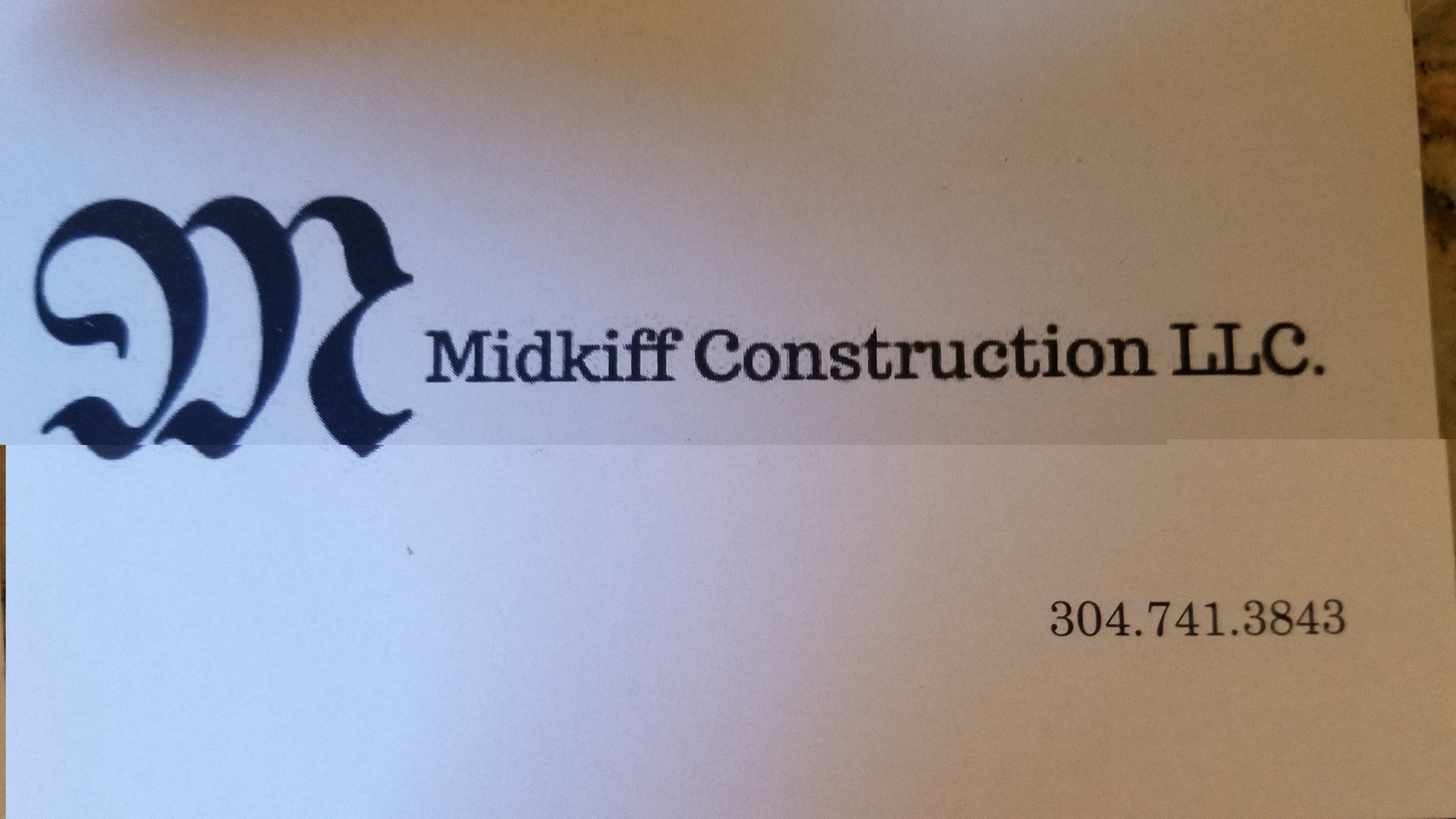 Midkiff Construction, LLC Logo