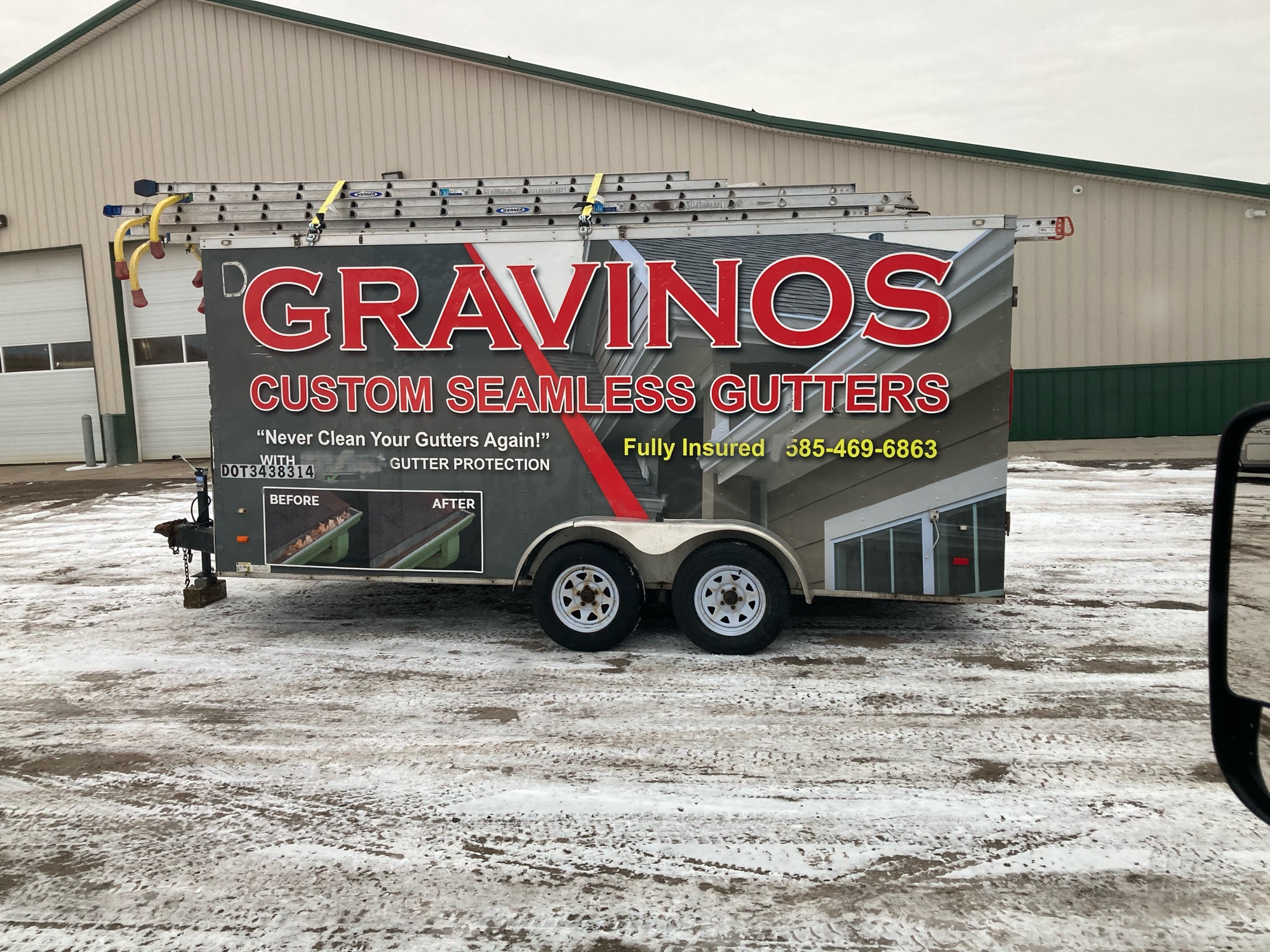 Gravinos Seamless Gutters Logo