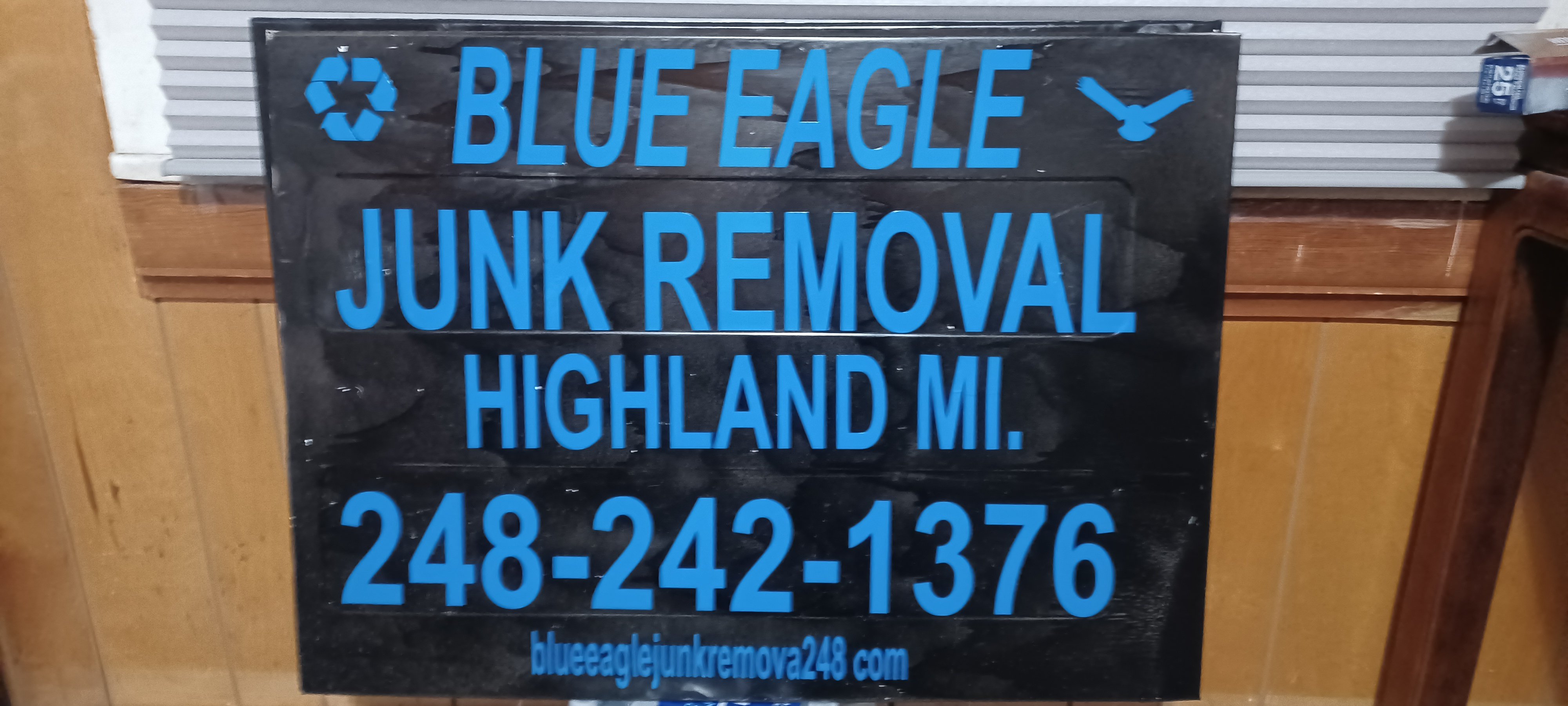 Blue Eagle Junk Removal Logo