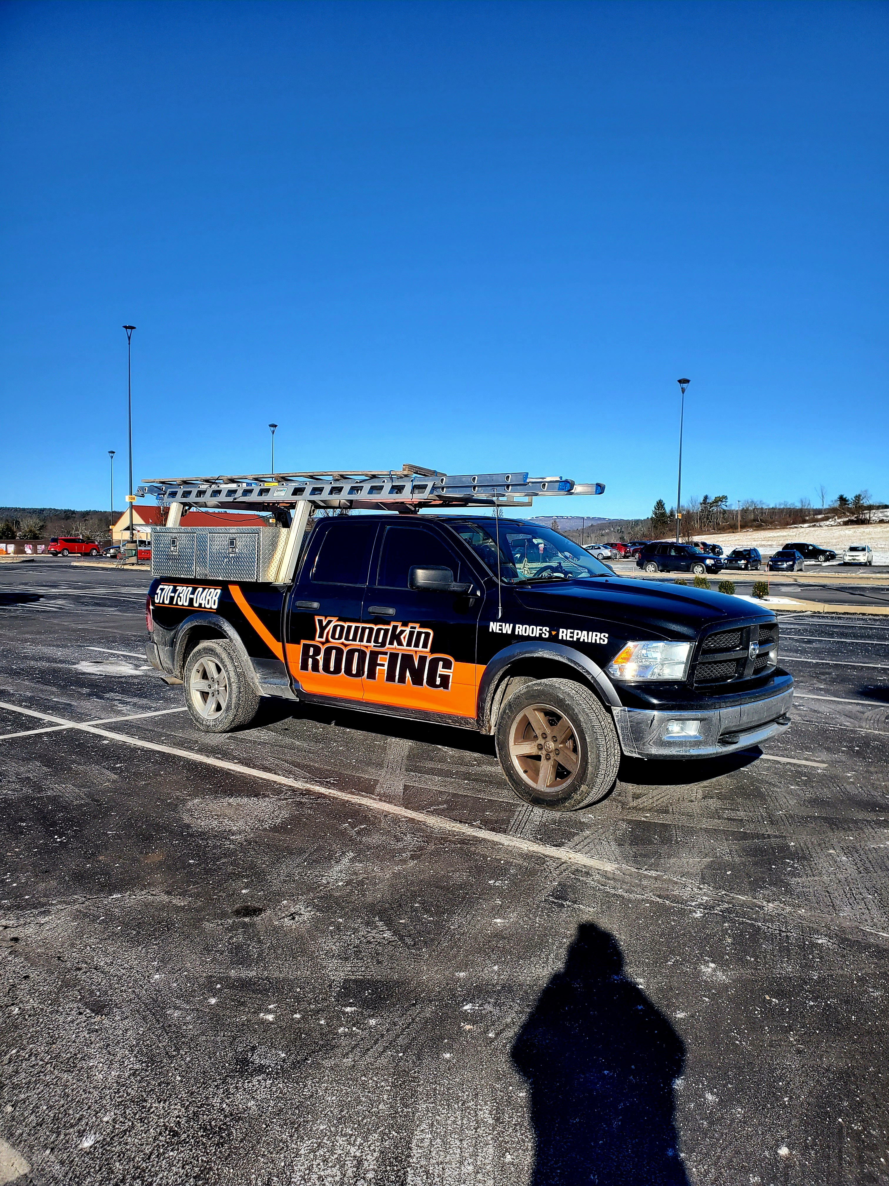 Scott Youngkin Contracting & Roofing Logo