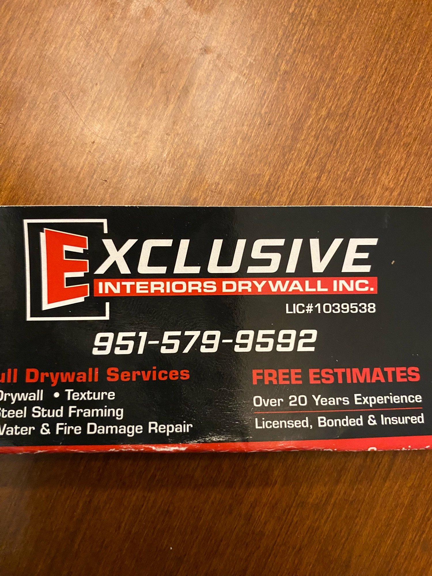 Exclusive Interiors Drywall Logo
