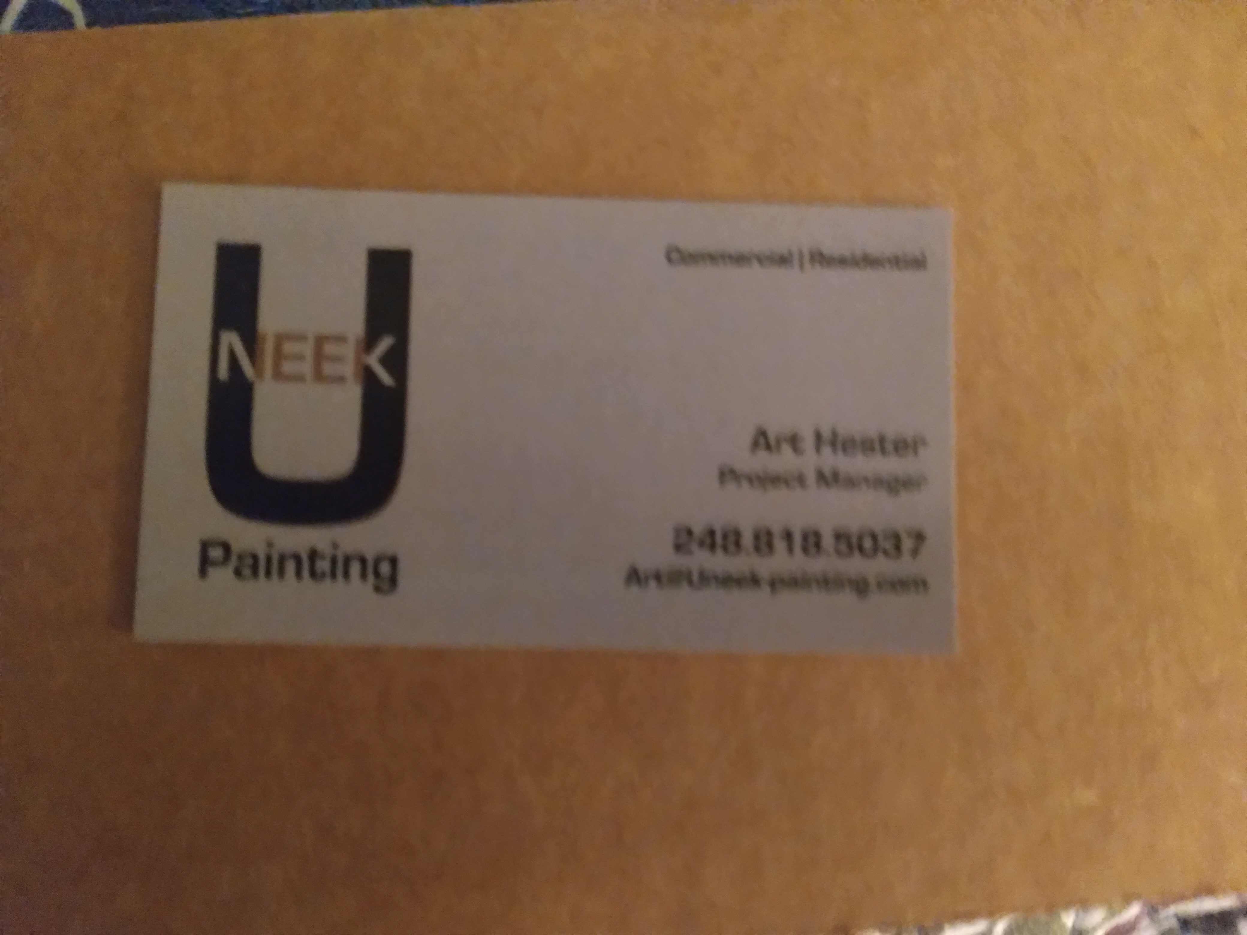 Uneek Painting Logo