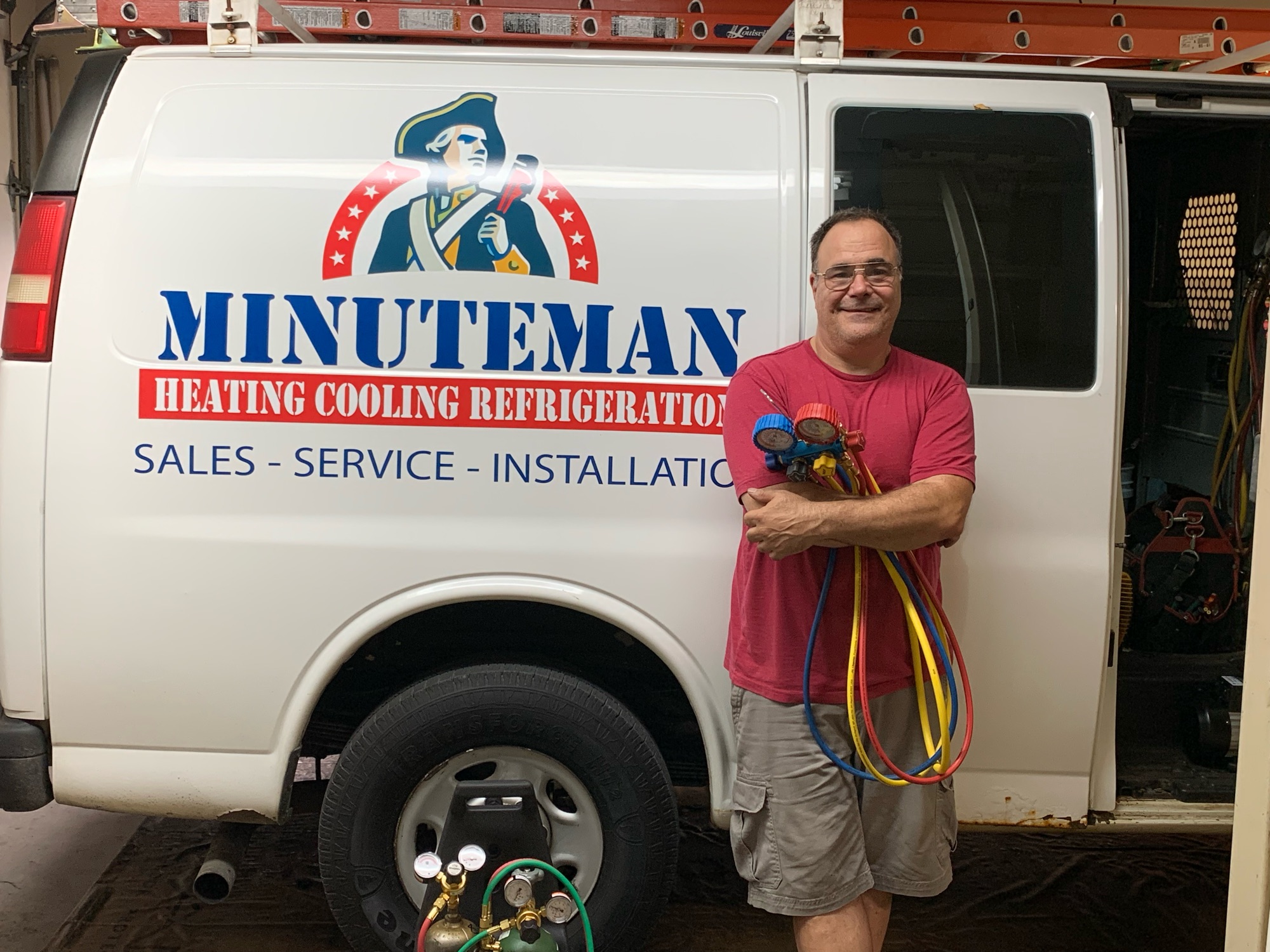 Minuteman Heating Cooling Refrigeration, LLC Logo