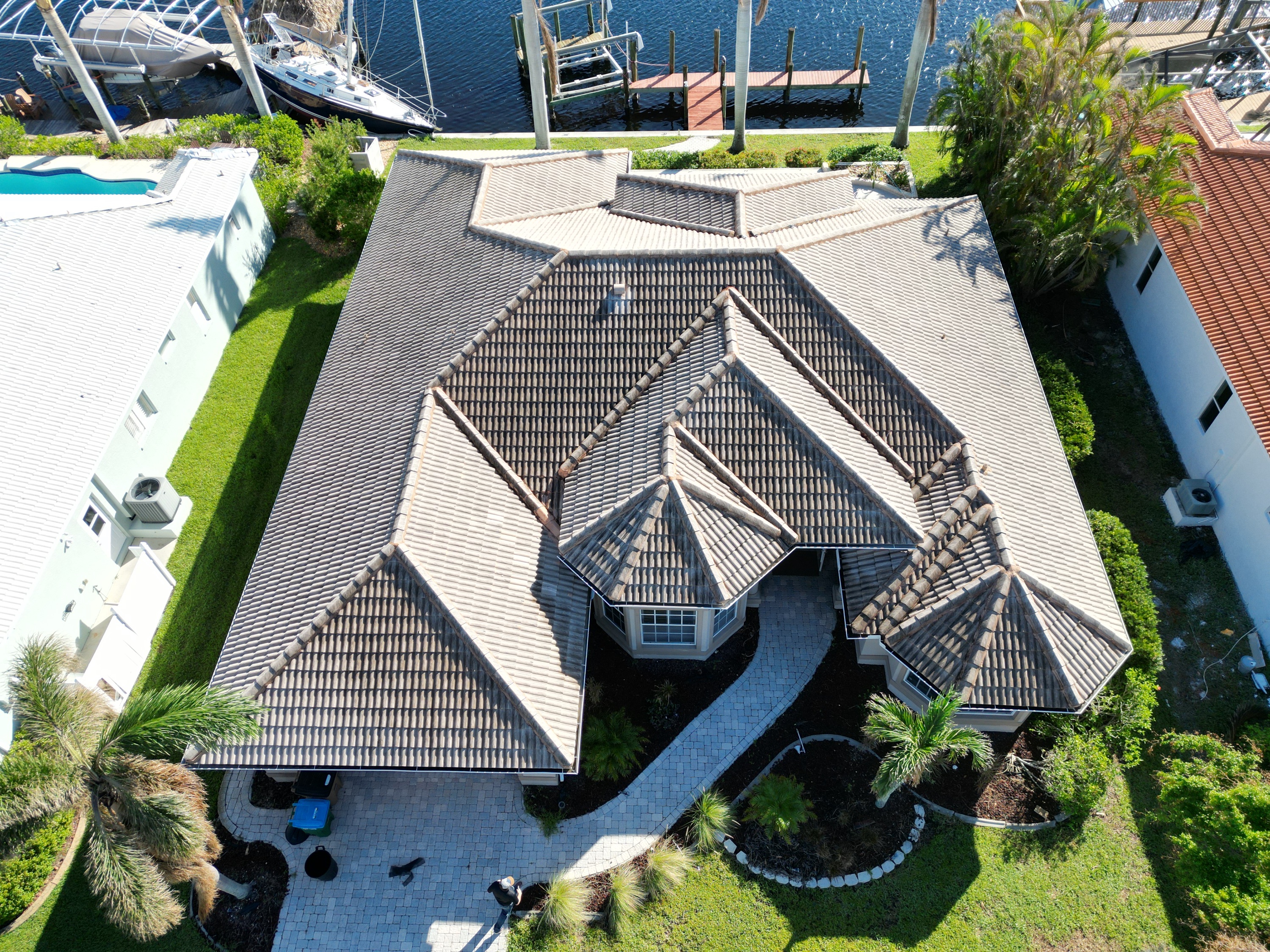 Florida Roofing and Gutters Logo