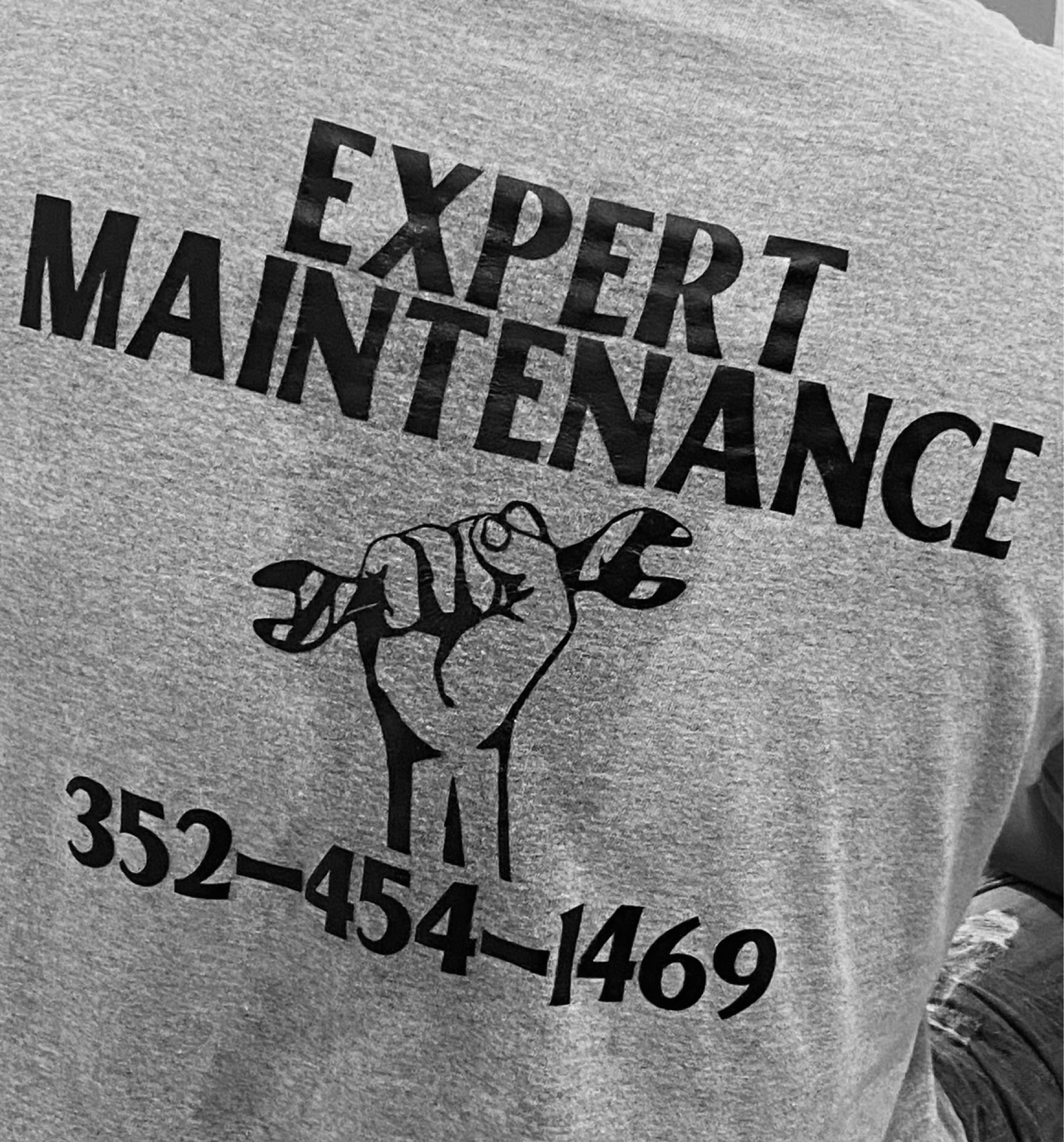 Expert Maintenance Logo