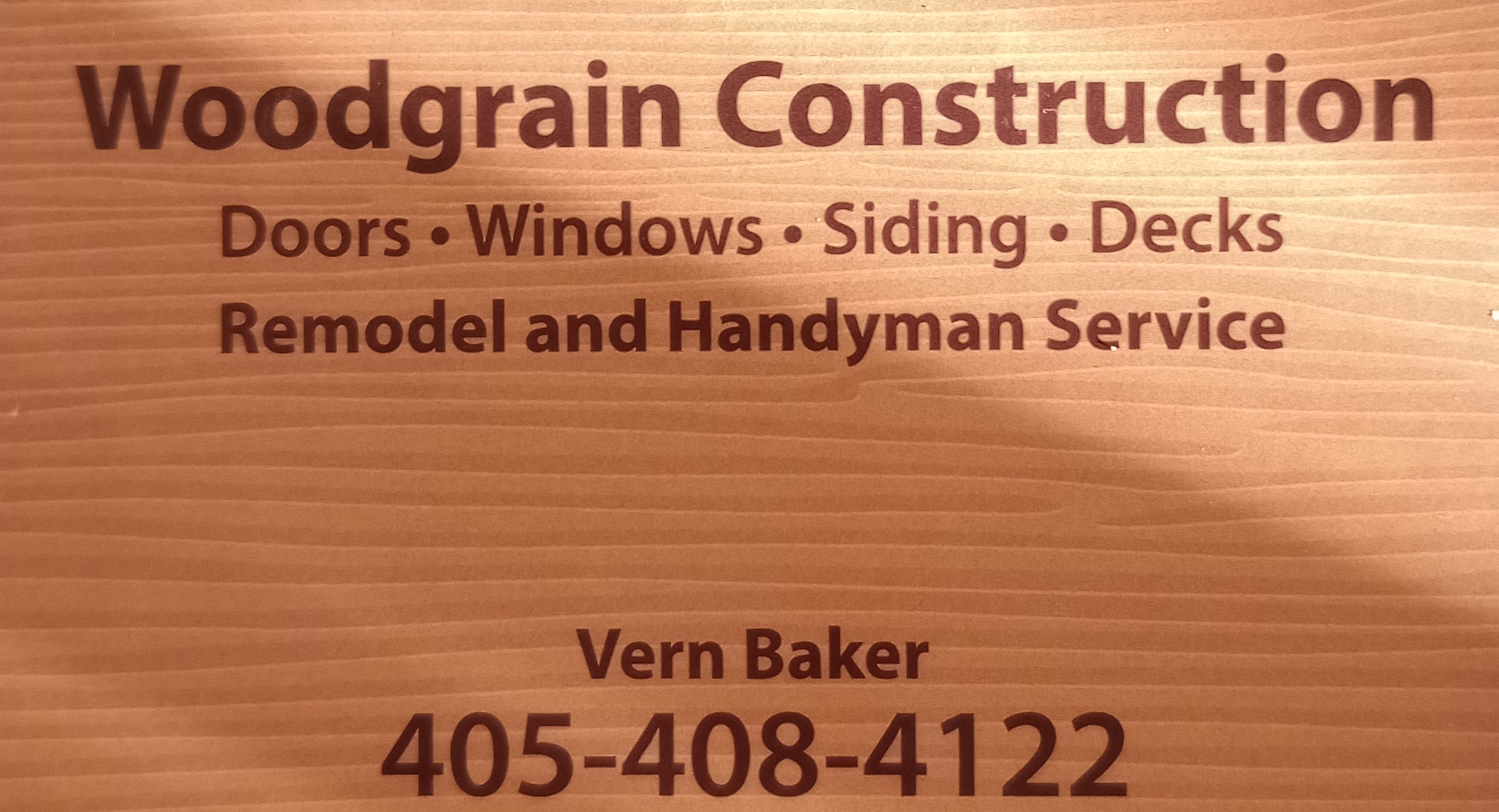 Woodgrain Construction Logo