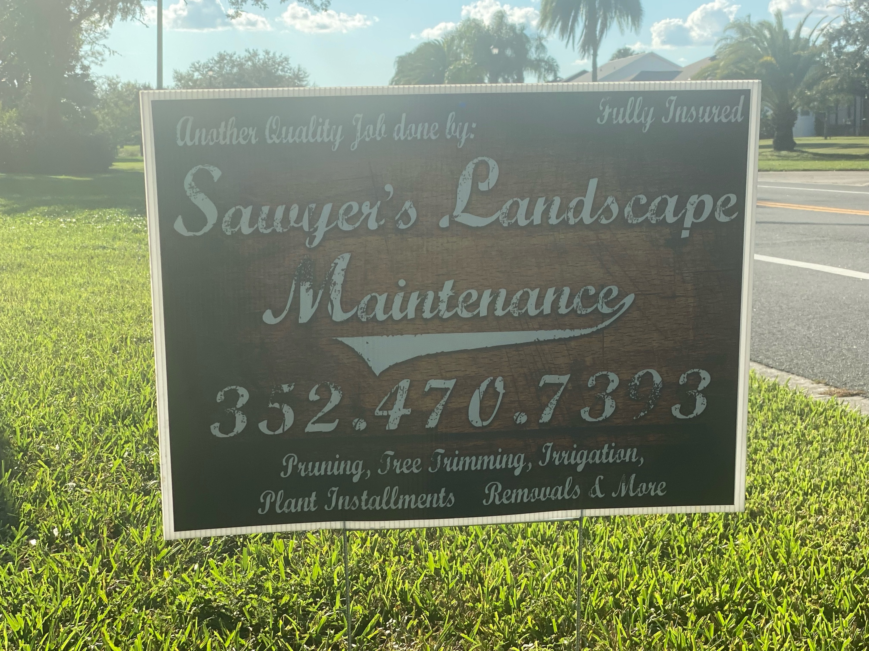 Sawyers Landscaping Maintenance Logo