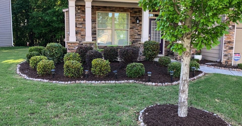 Mulch Spread and Lawn Care Logo