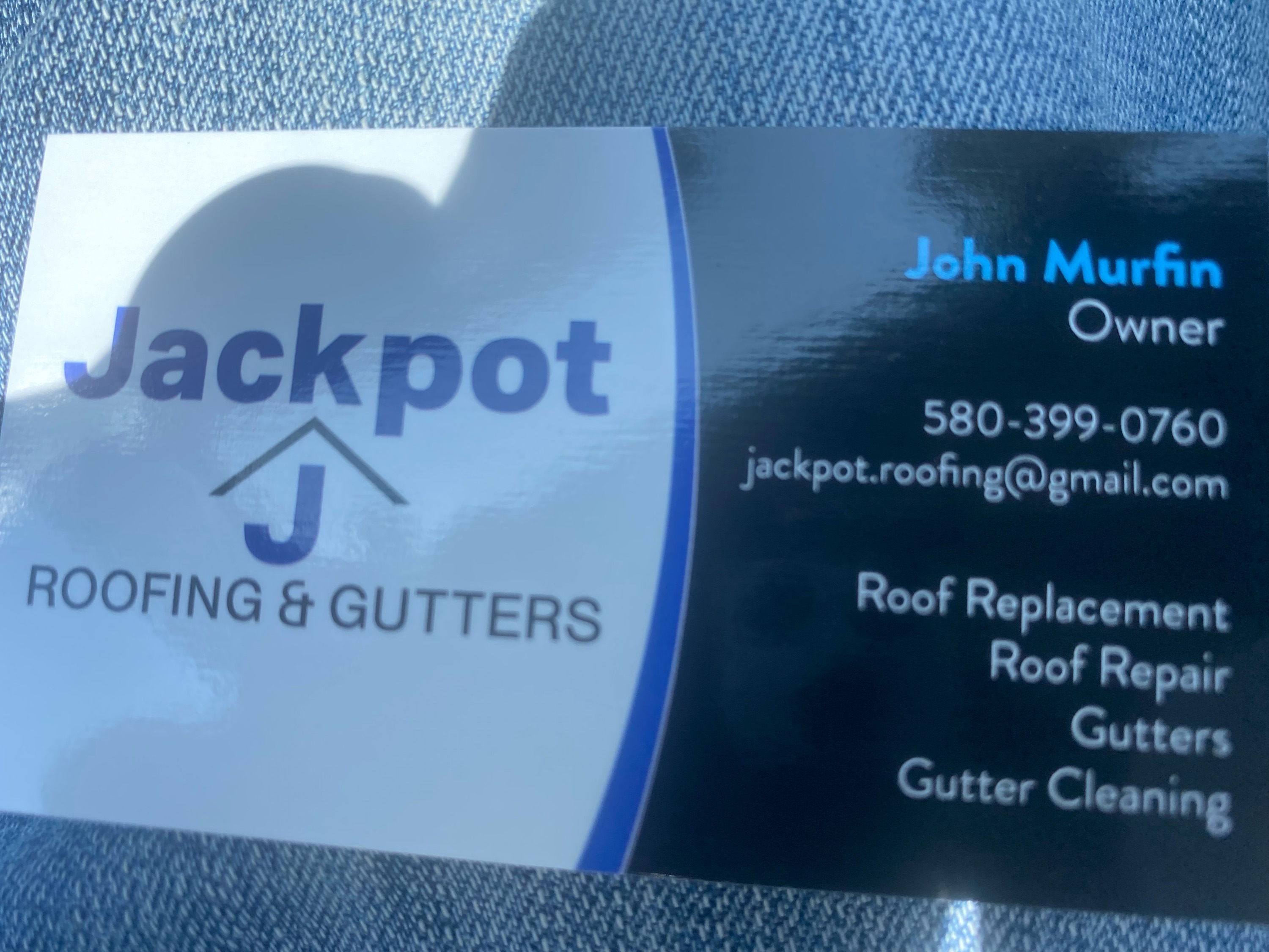 Jackpot Roofing and Gutters Logo