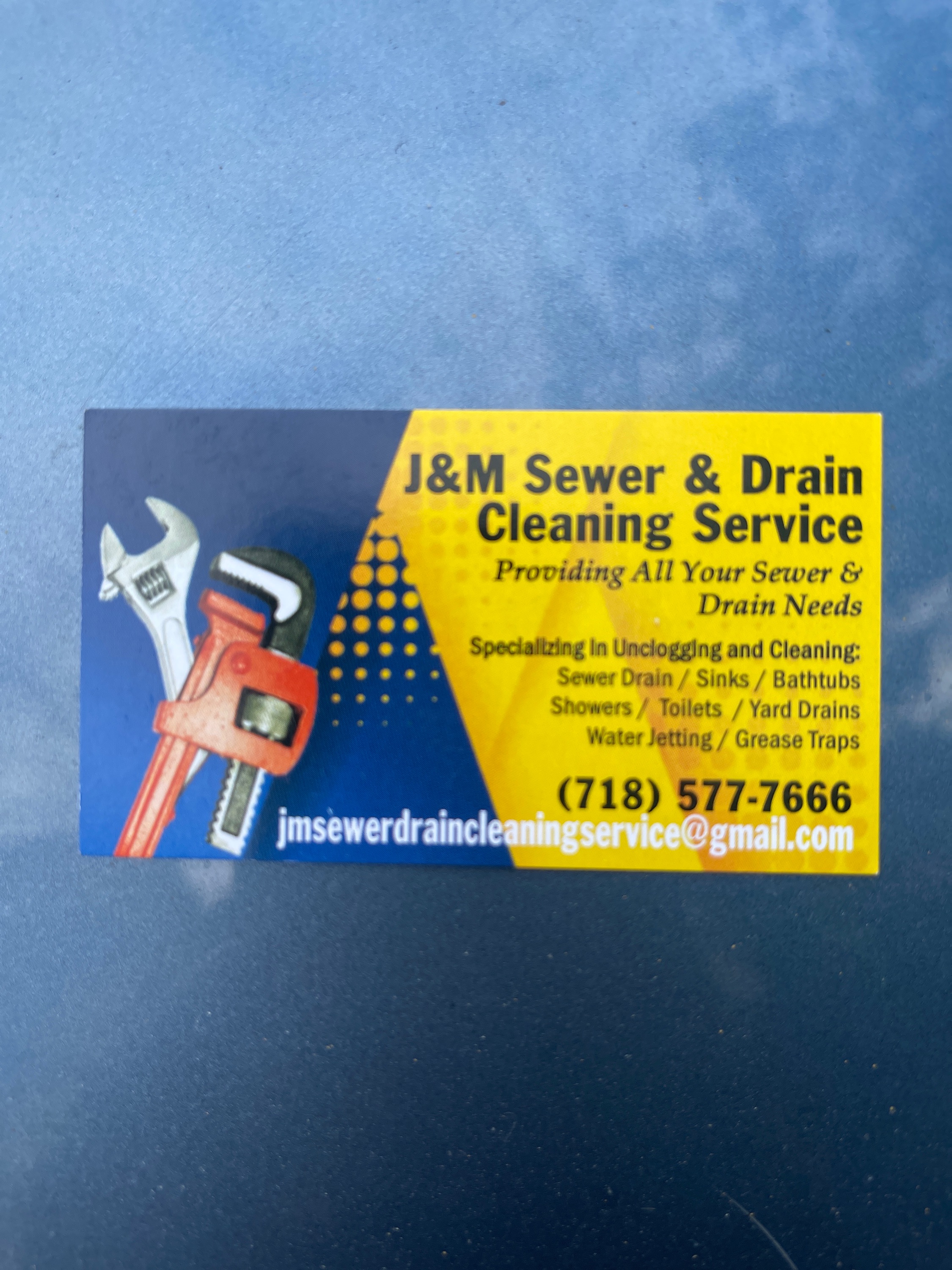 J&M Sewer and Drain Cleaning Service Logo