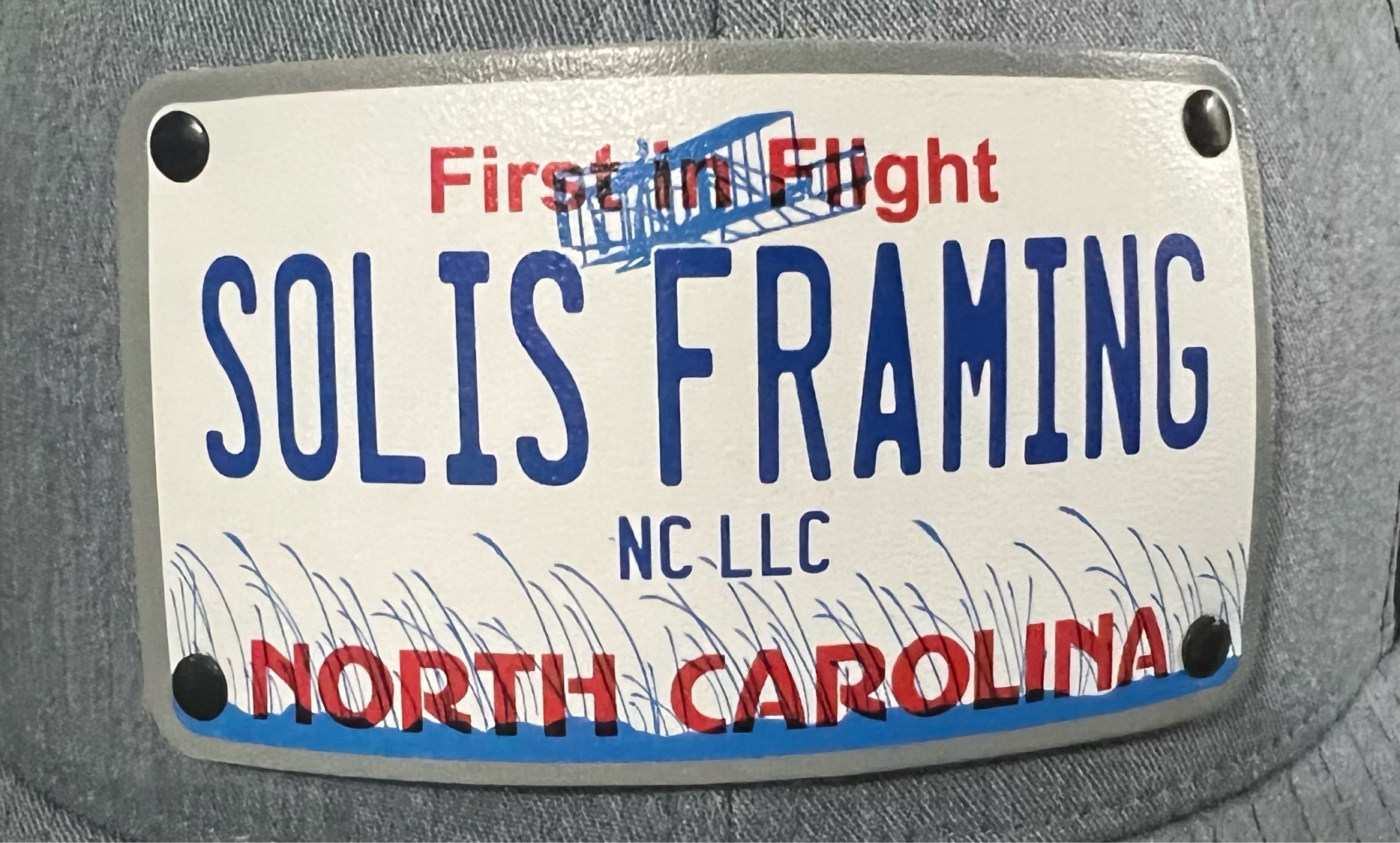 Solis Framing NC LLC Logo