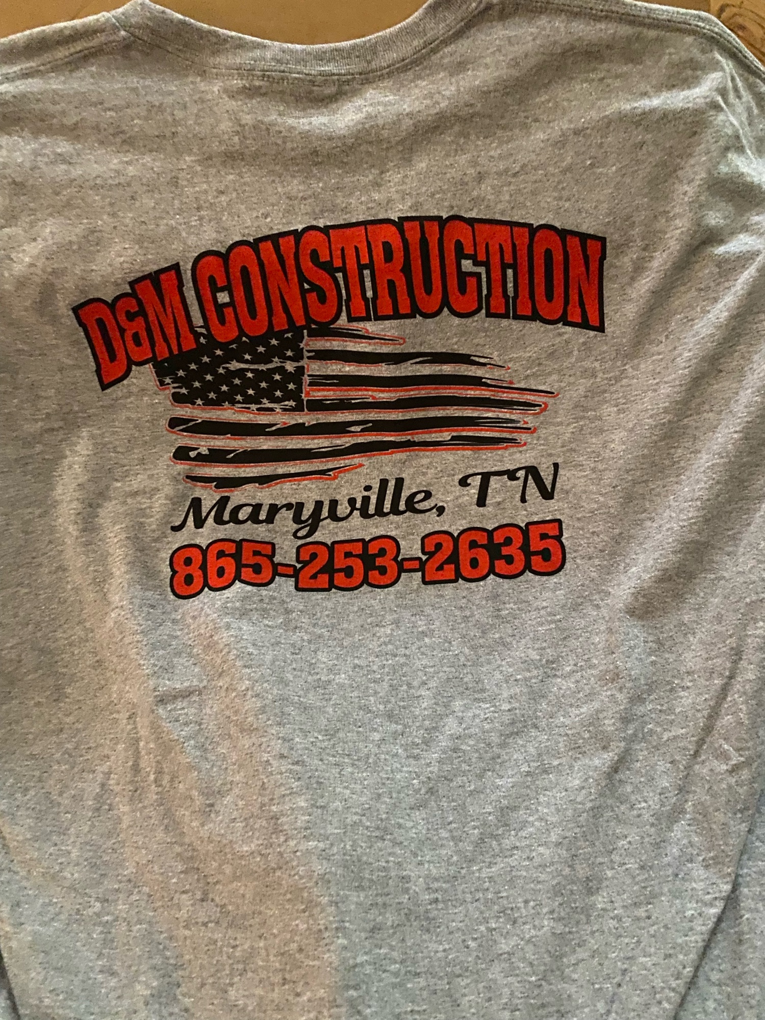 D & M Construction Logo