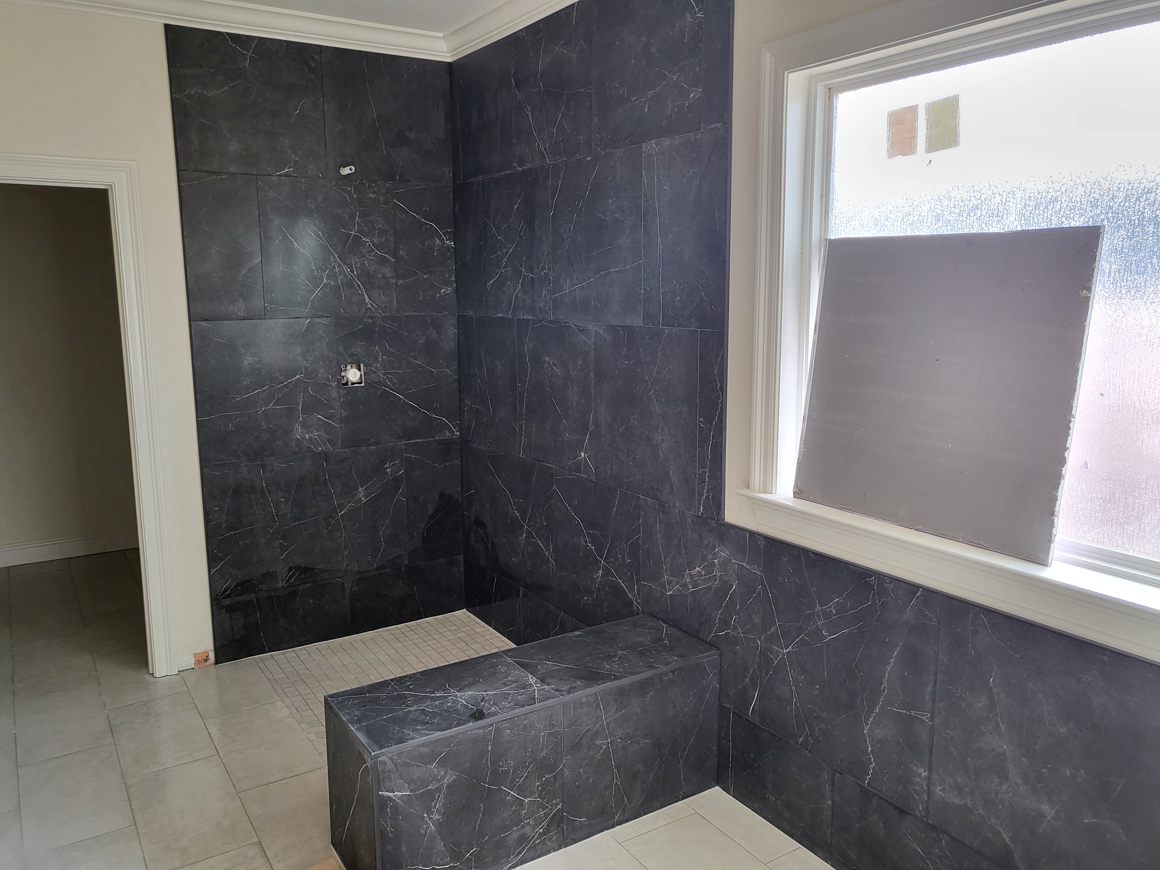 Neate Bathroom Remodeling and Tiling LLC Logo