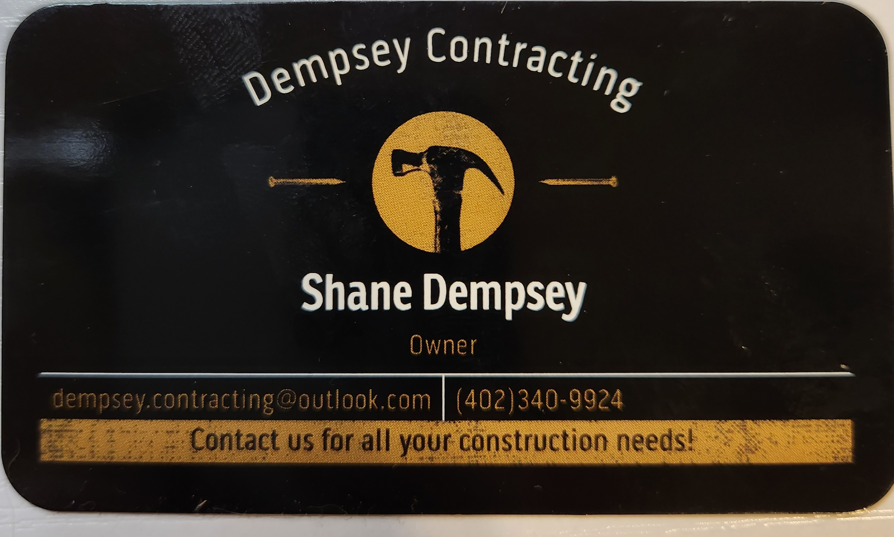 Dempsey Contracting Logo