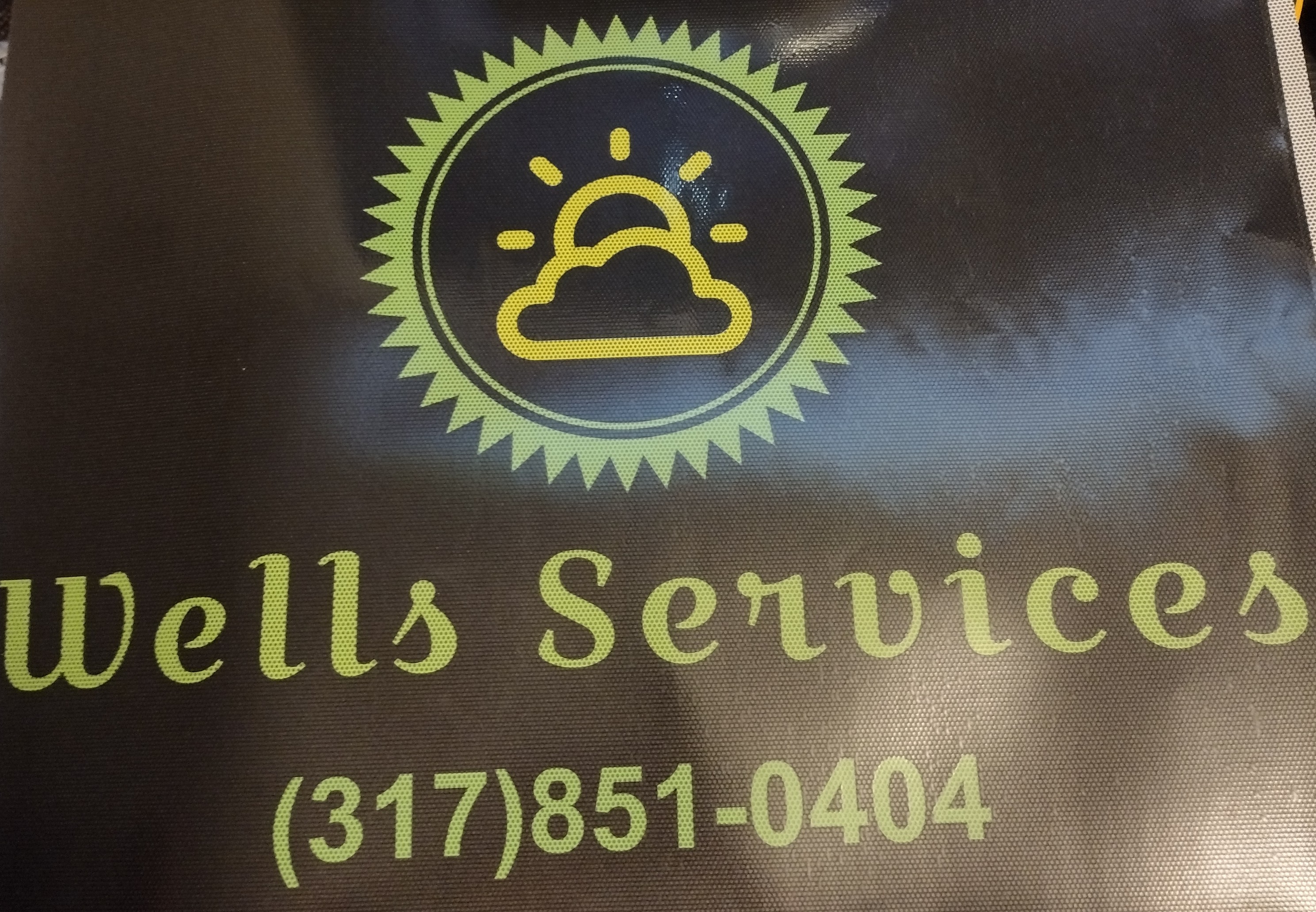 Wells Services, LLC Logo