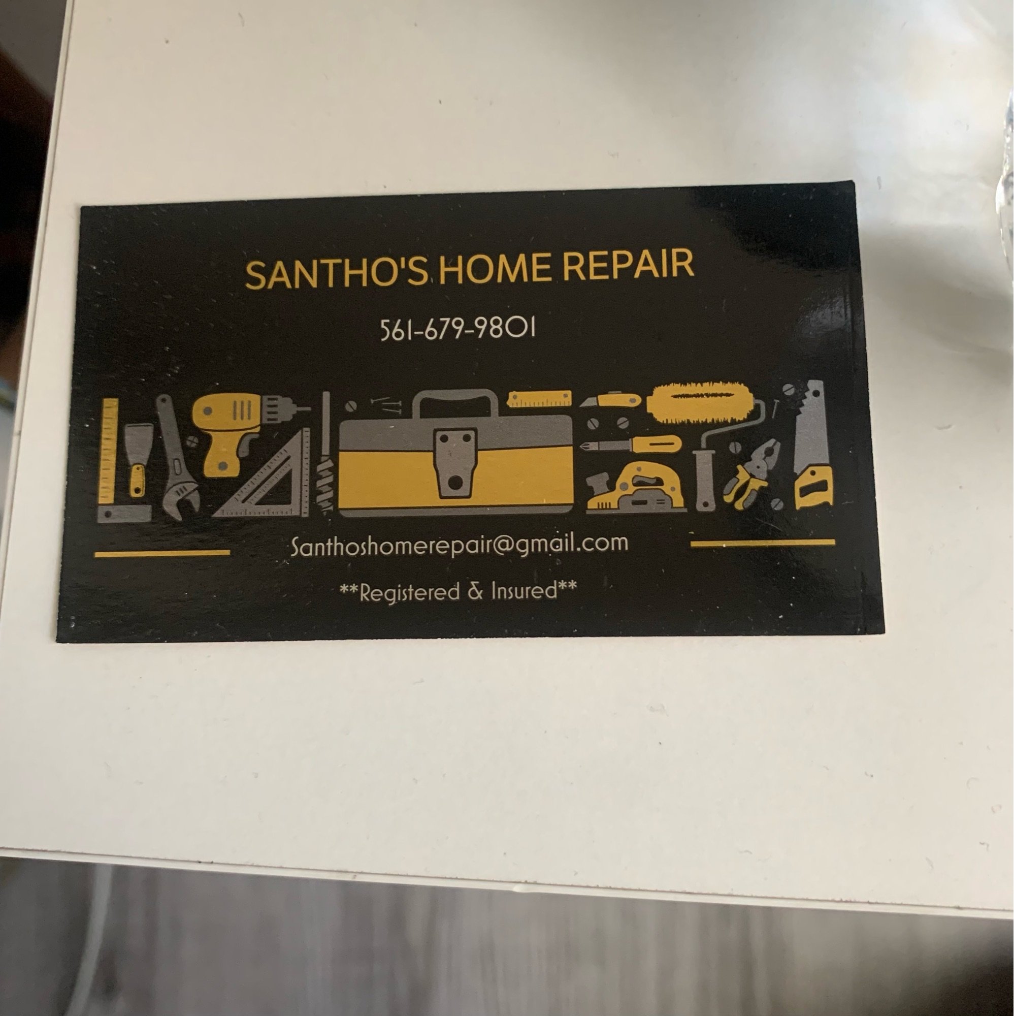 SANTHOS Home Repair Logo