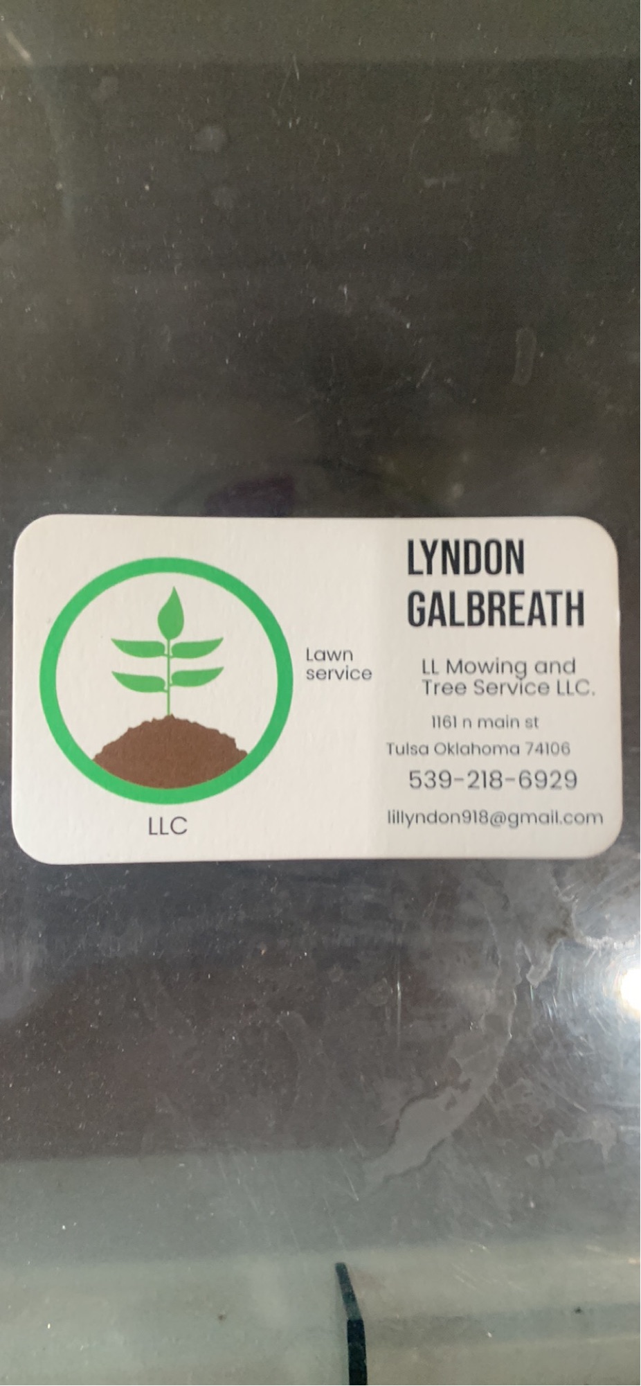LL Mowing and Tree Service Logo