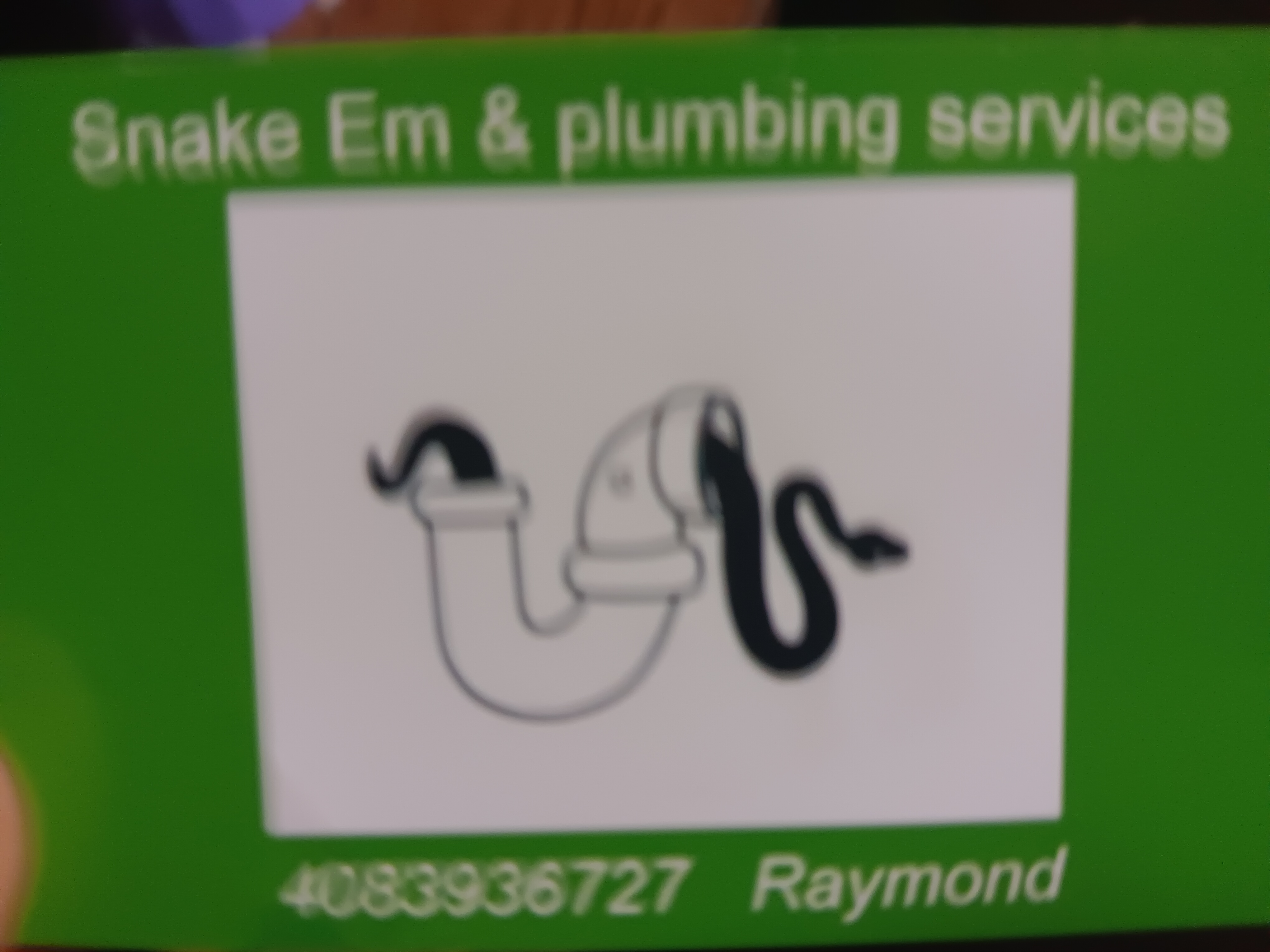 Snake Em & Plumbing Services-Unlicensed Contractor Logo