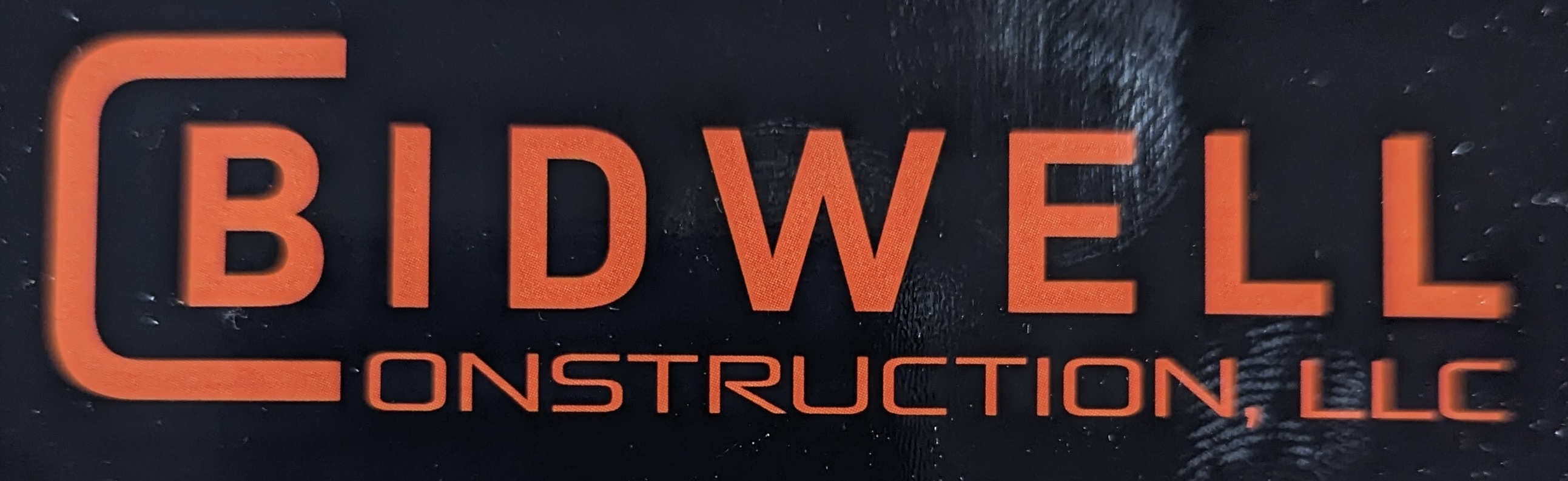 BIDWELL CONSTRUCTION LLC Logo