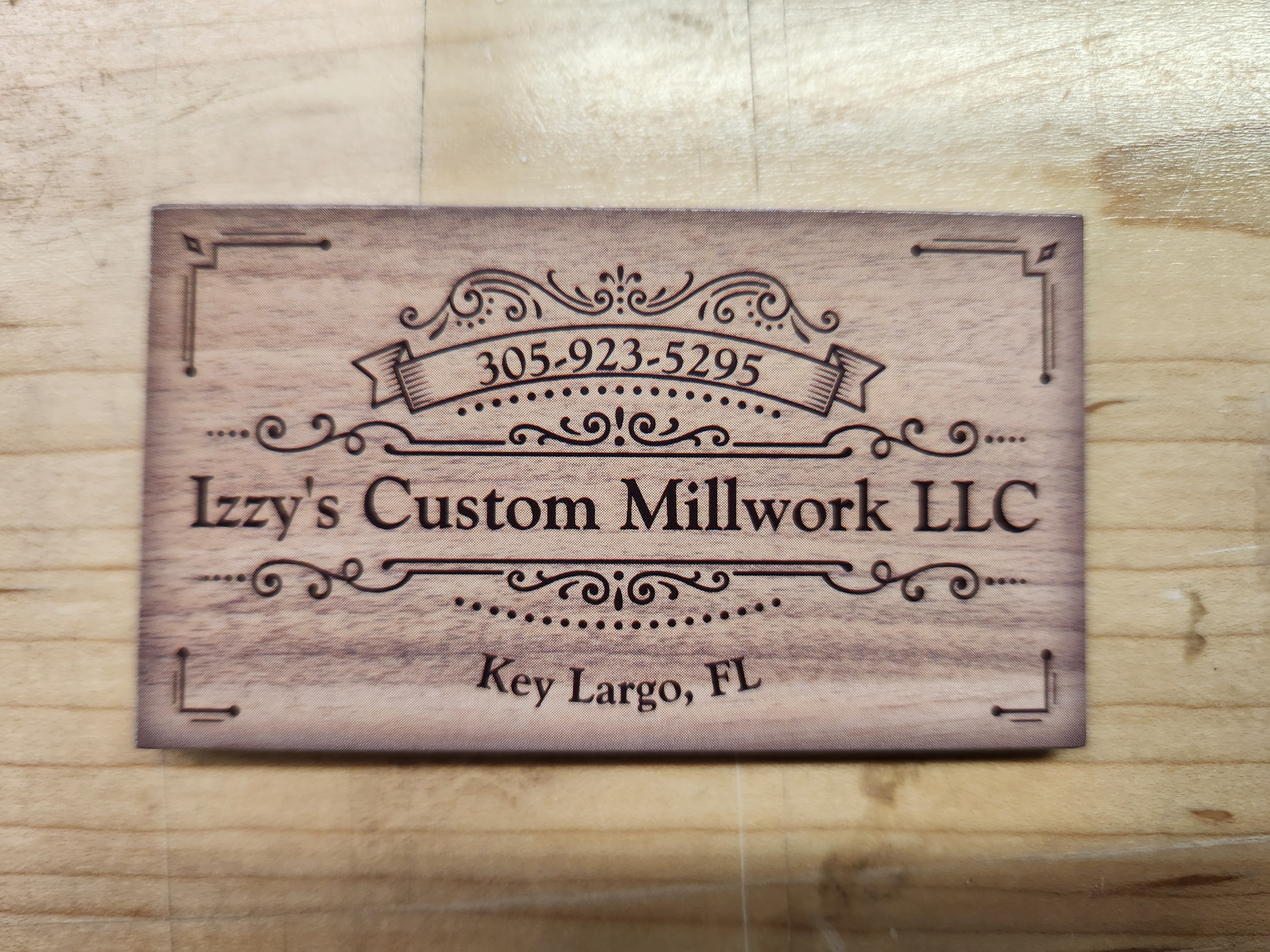 Izzy's Custom Millwork, LLC Logo