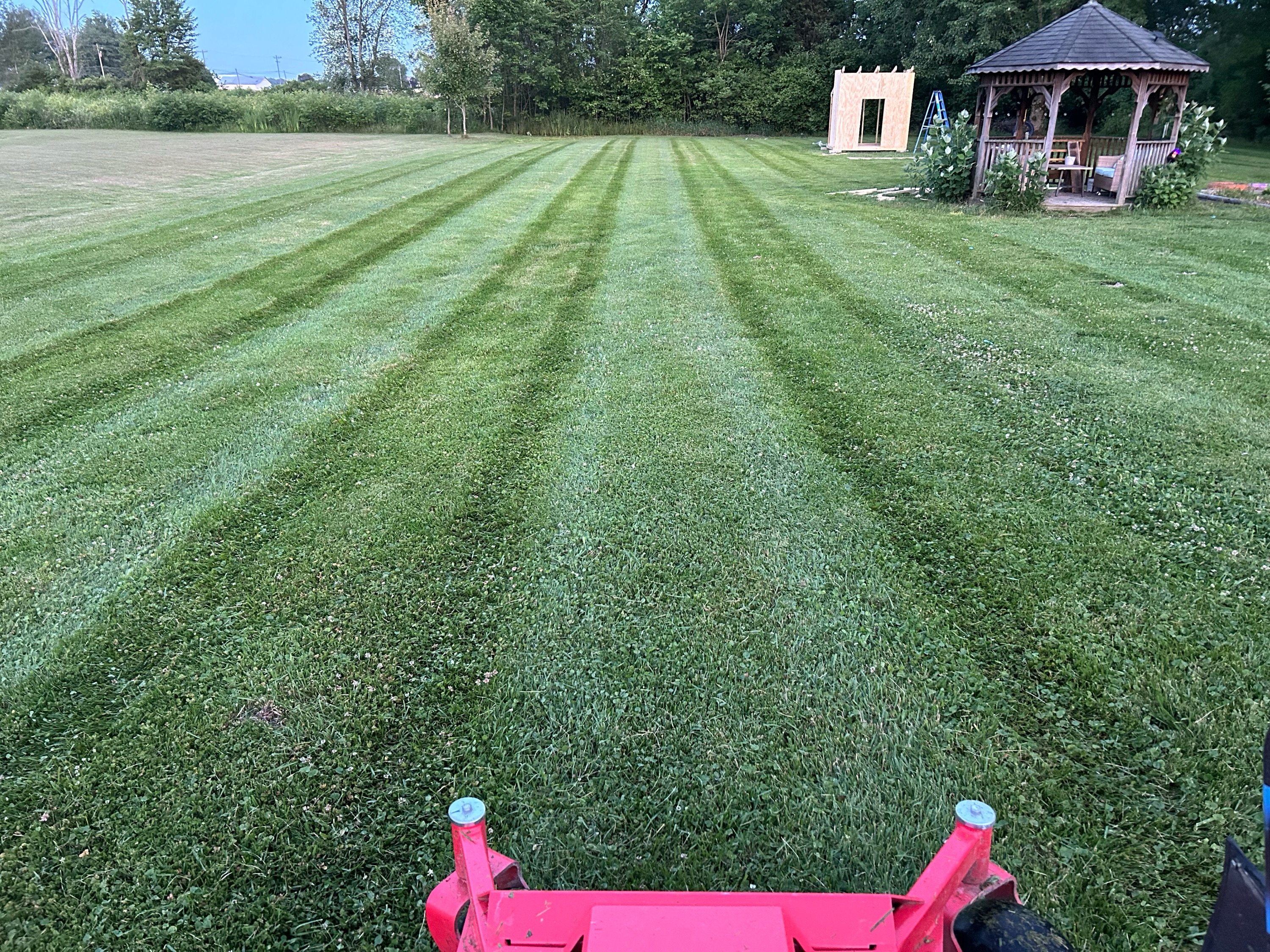 M H Mowing LLC Logo