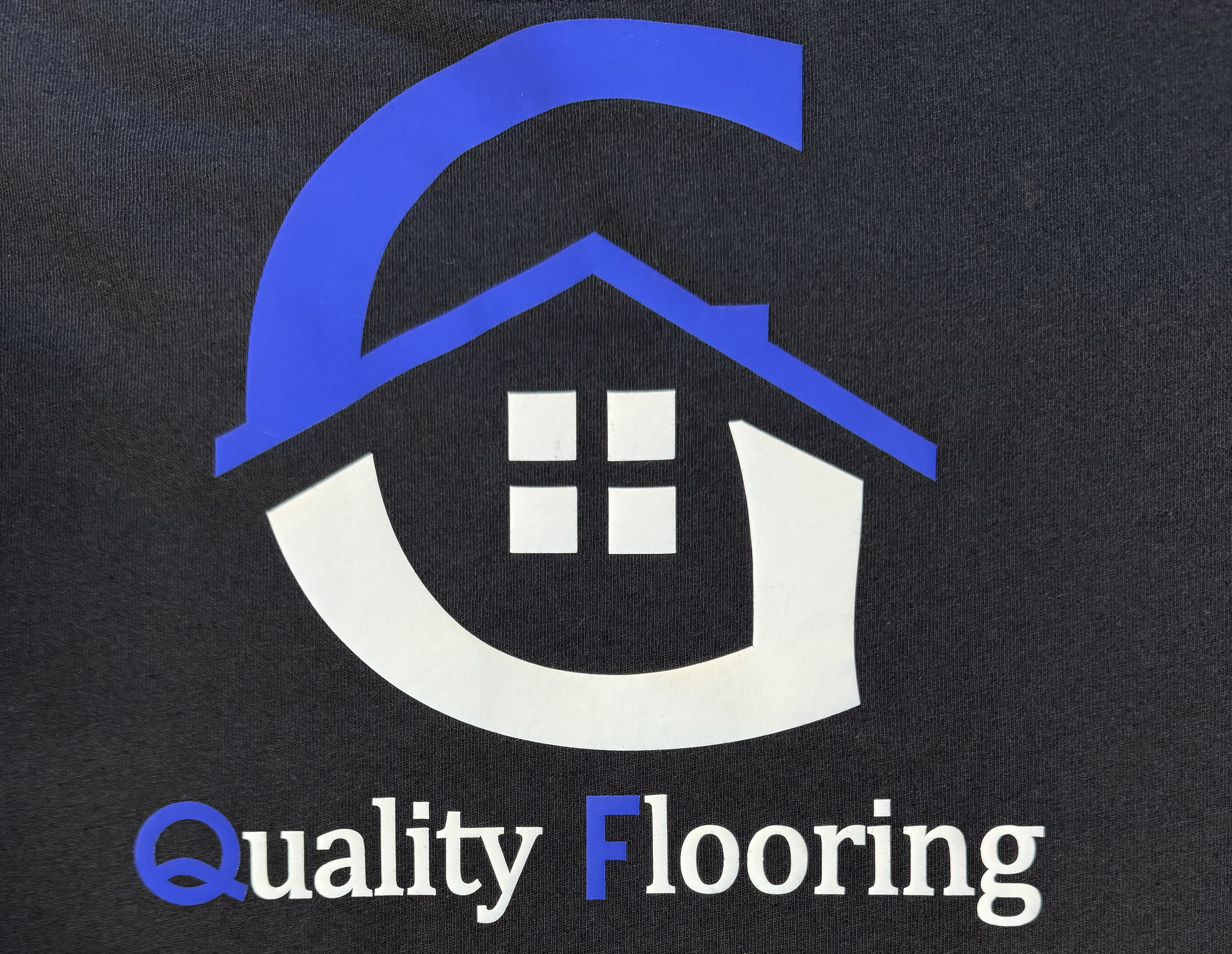 Guereque's Quality Flooring Logo