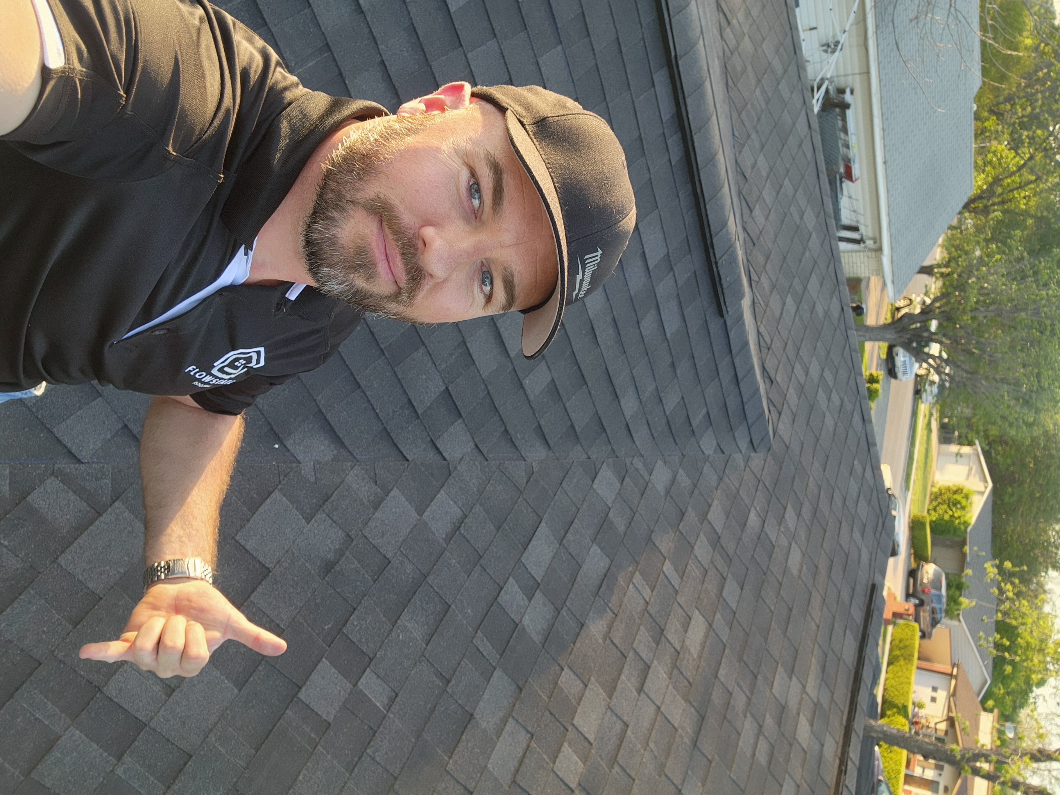 Flowstate Roofing L.L.C. Logo