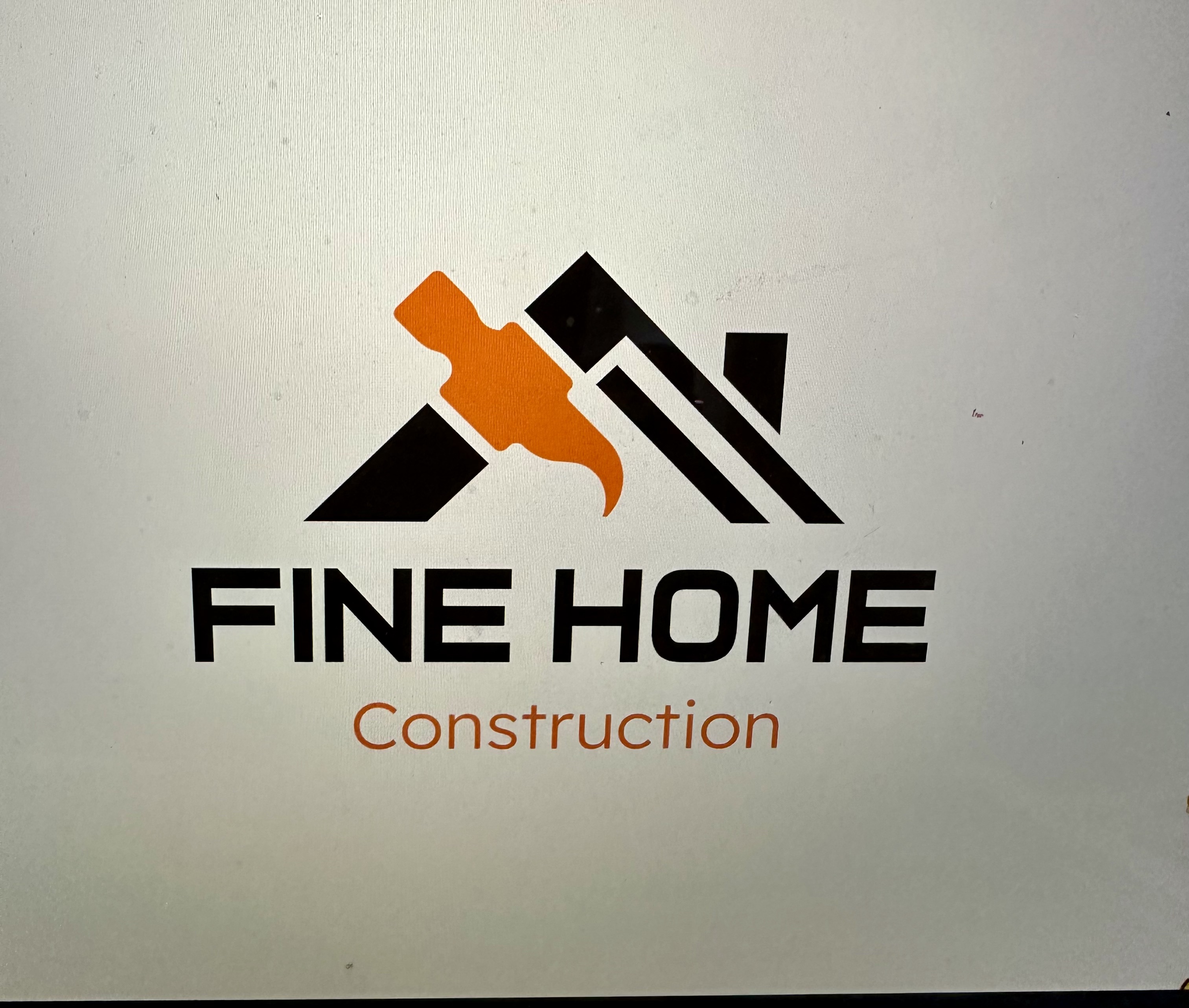 Fine Home Construction Inc. Logo