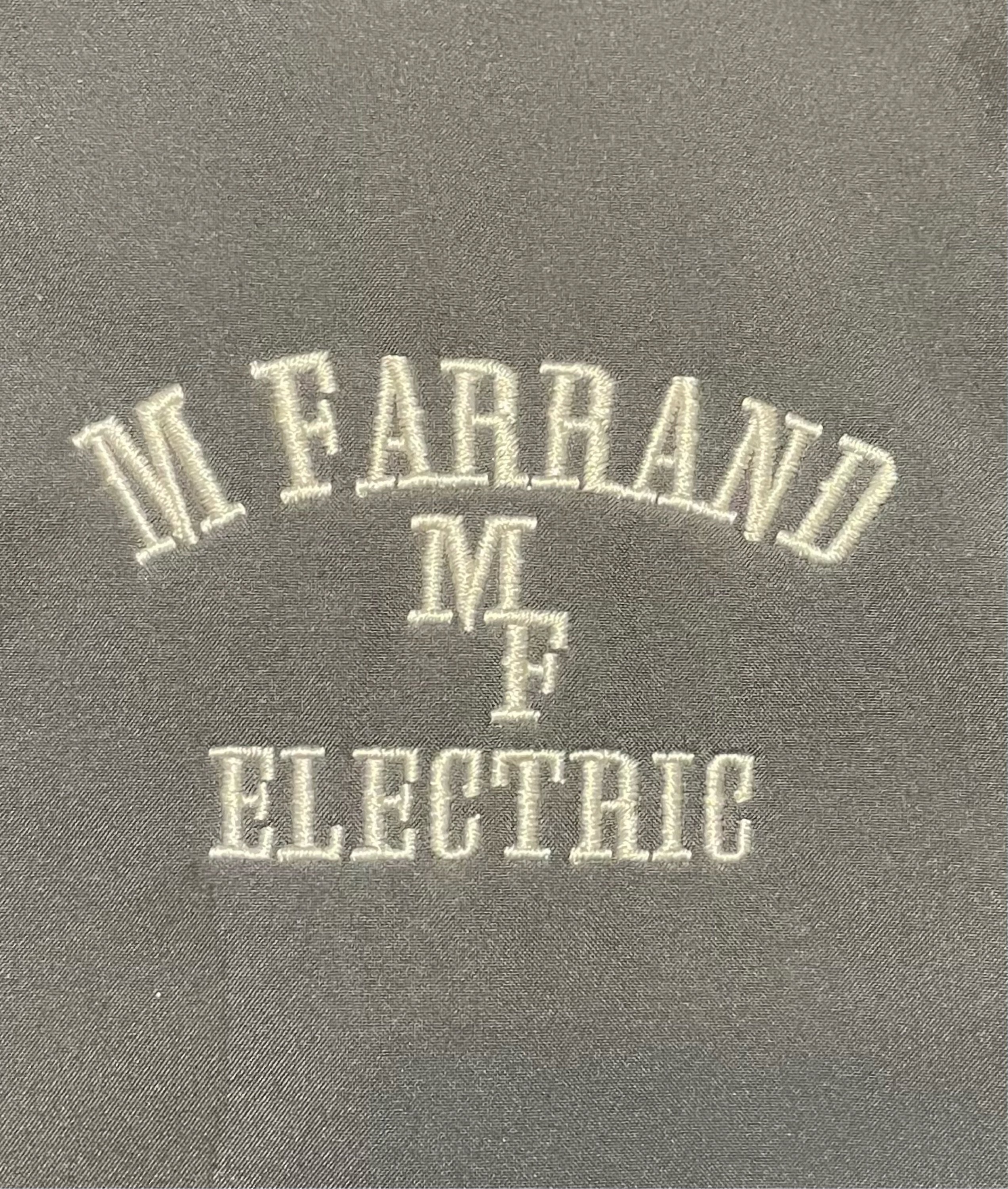 M Farrand Electric Logo