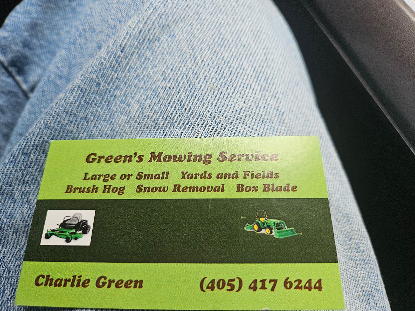 Green's Mowing Service Logo