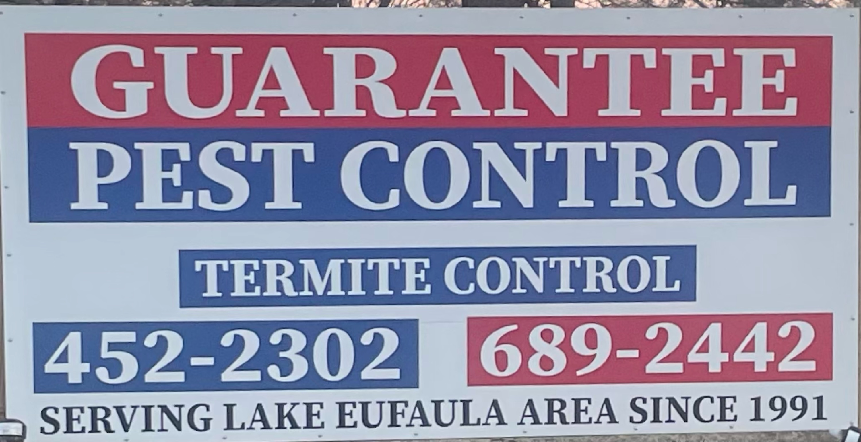 Guarantee Pest Control Logo