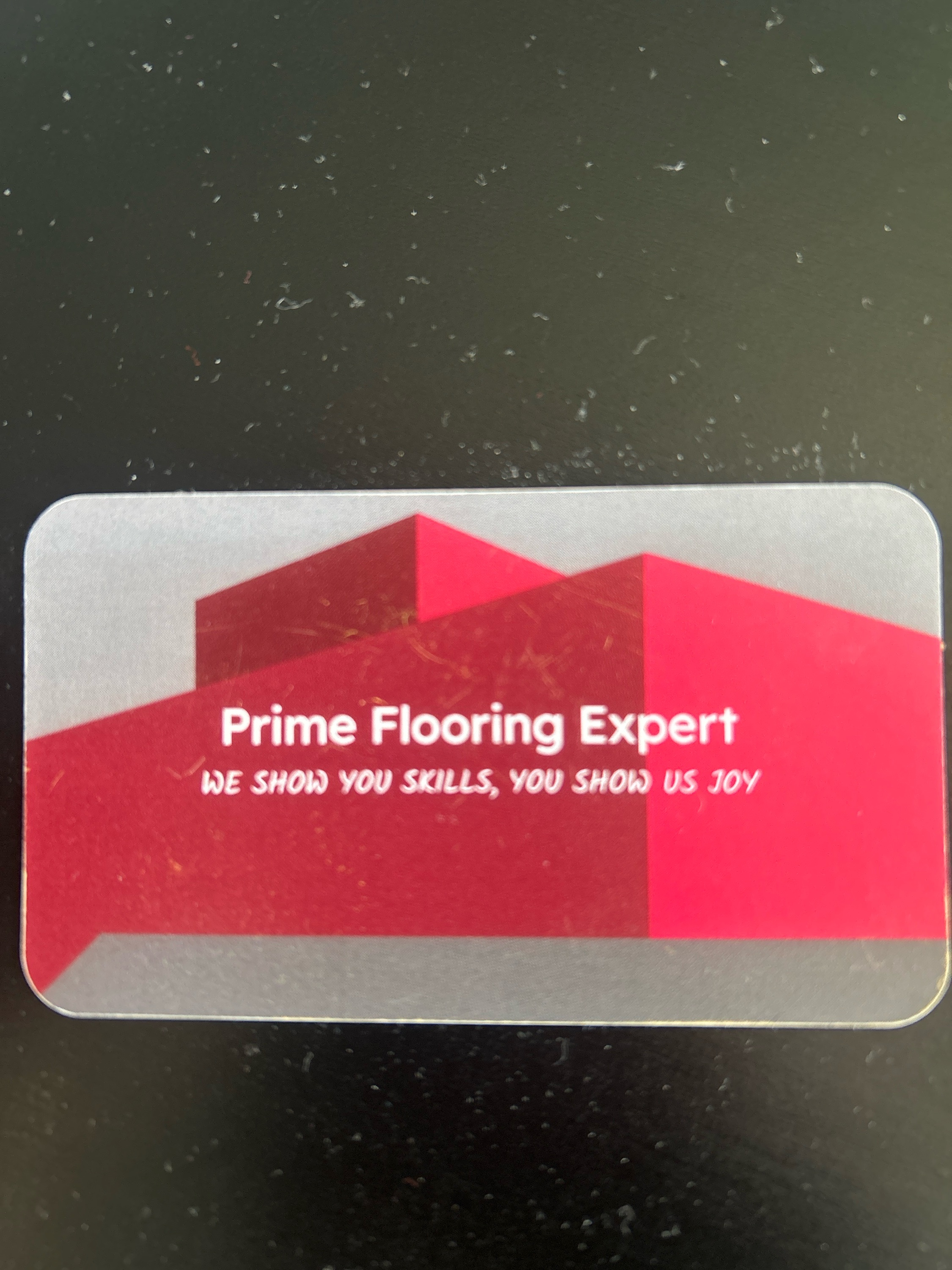 Prime Flooring Experts LLC Logo