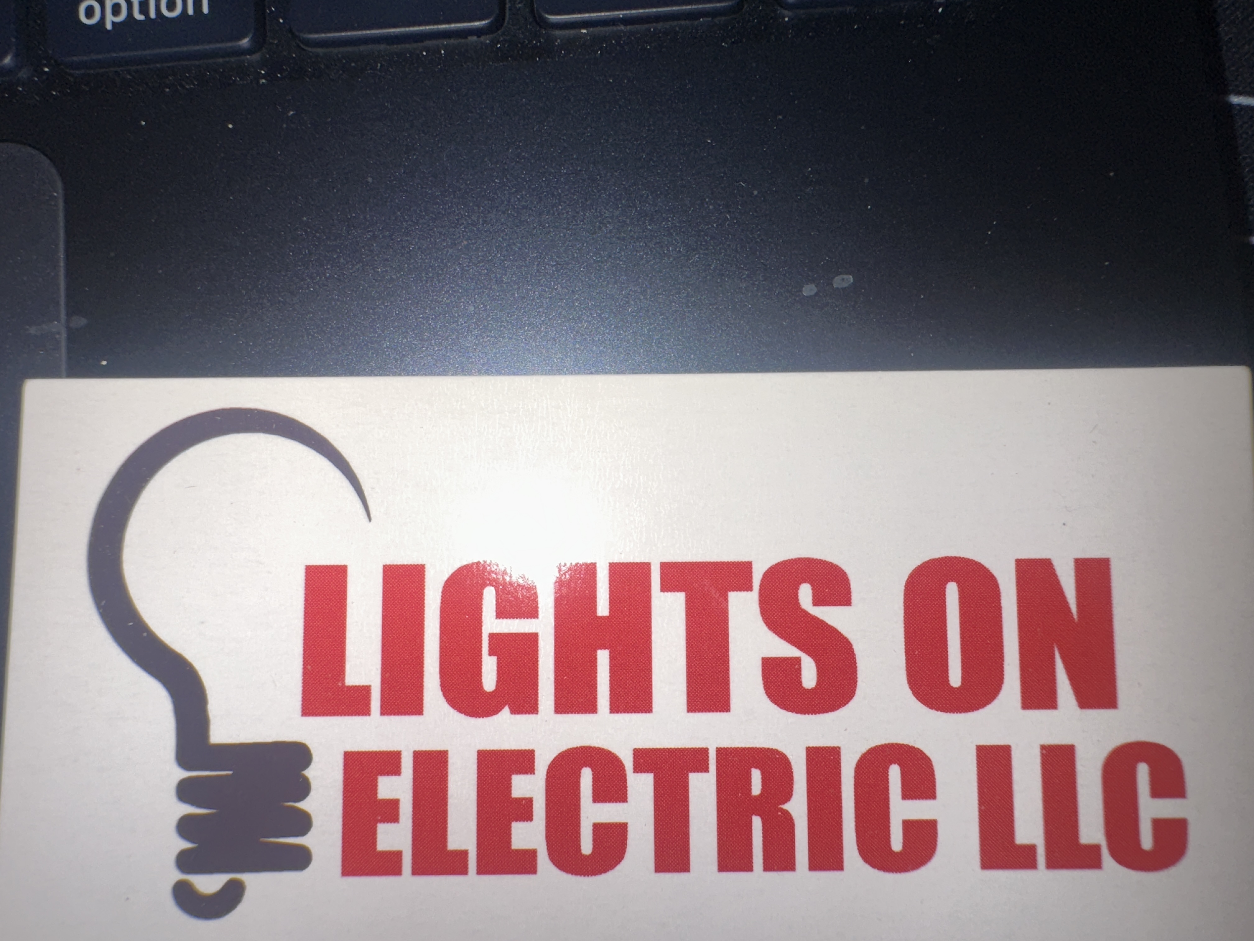 LIGHTS ON ELECTRIC, L.L.C. Logo