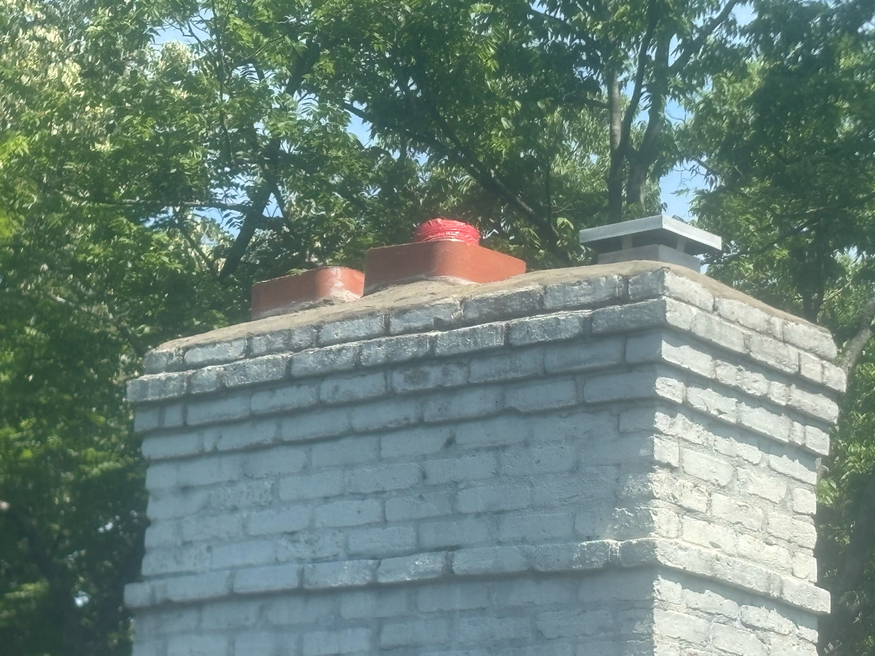 Heritage Roofing and Chimney LLC Logo