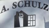 Albert T. Schulz Logo