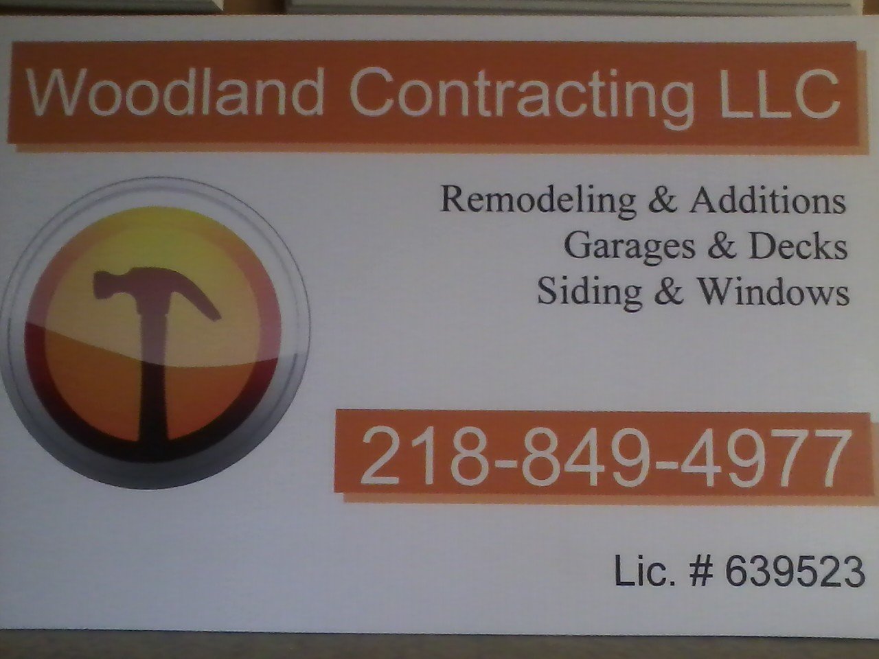Woodland Contracting, LLC Logo