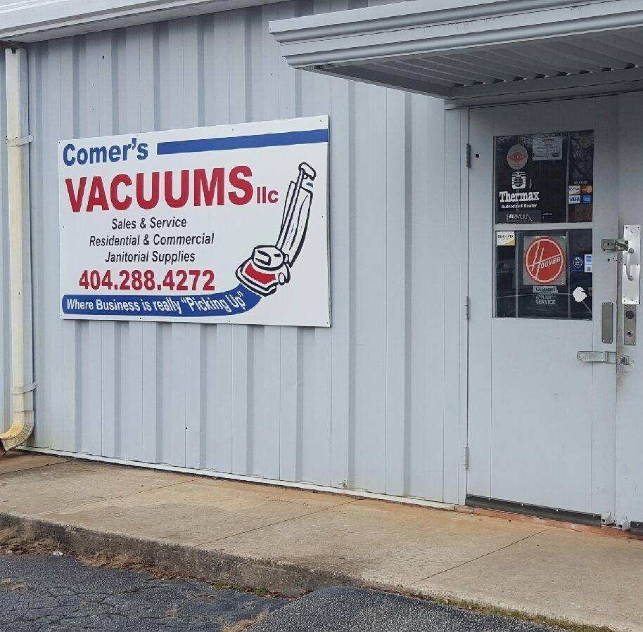 Comer's Vacuums, LLC Logo