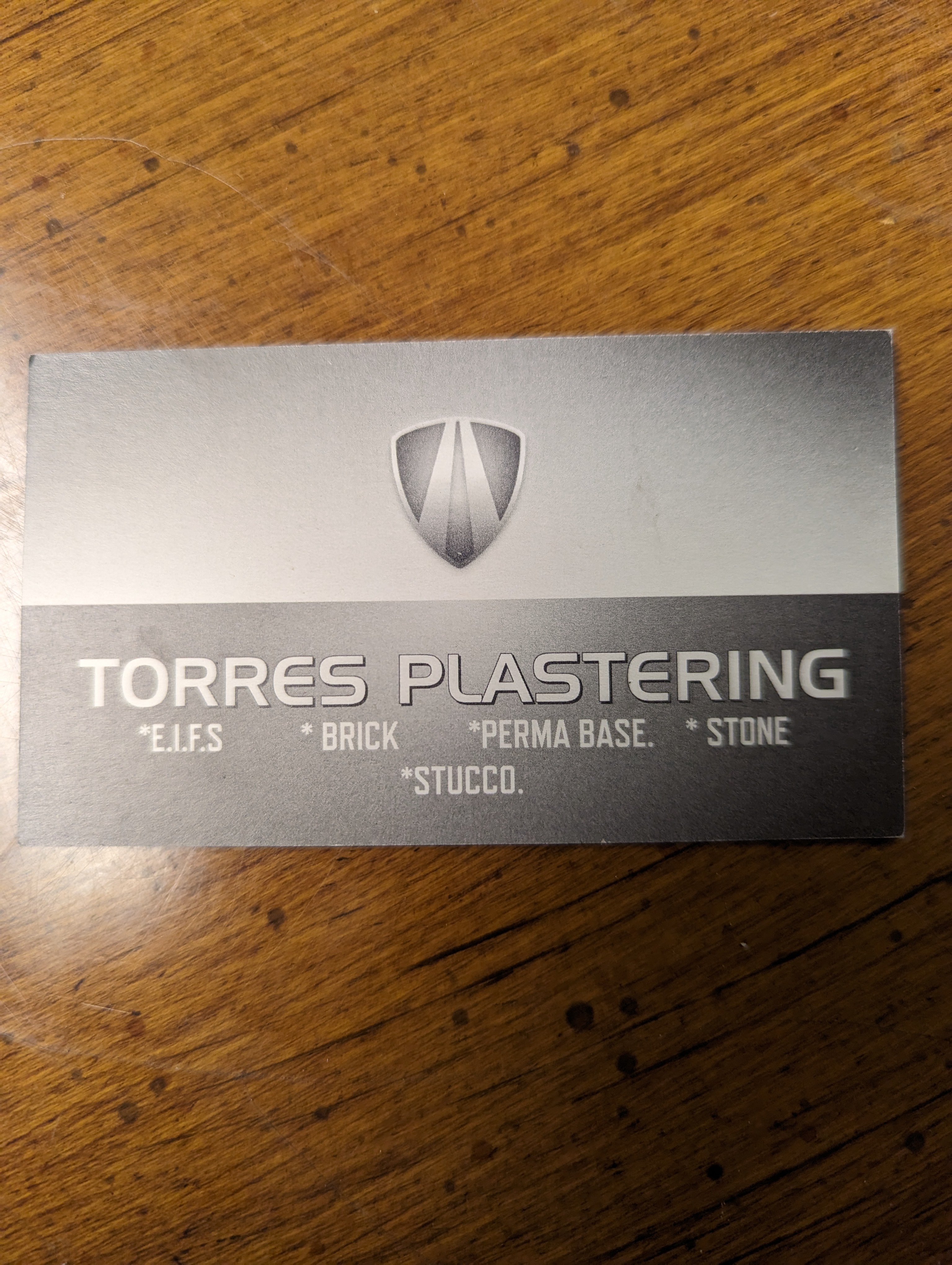 Torres Plastering, Inc. Logo