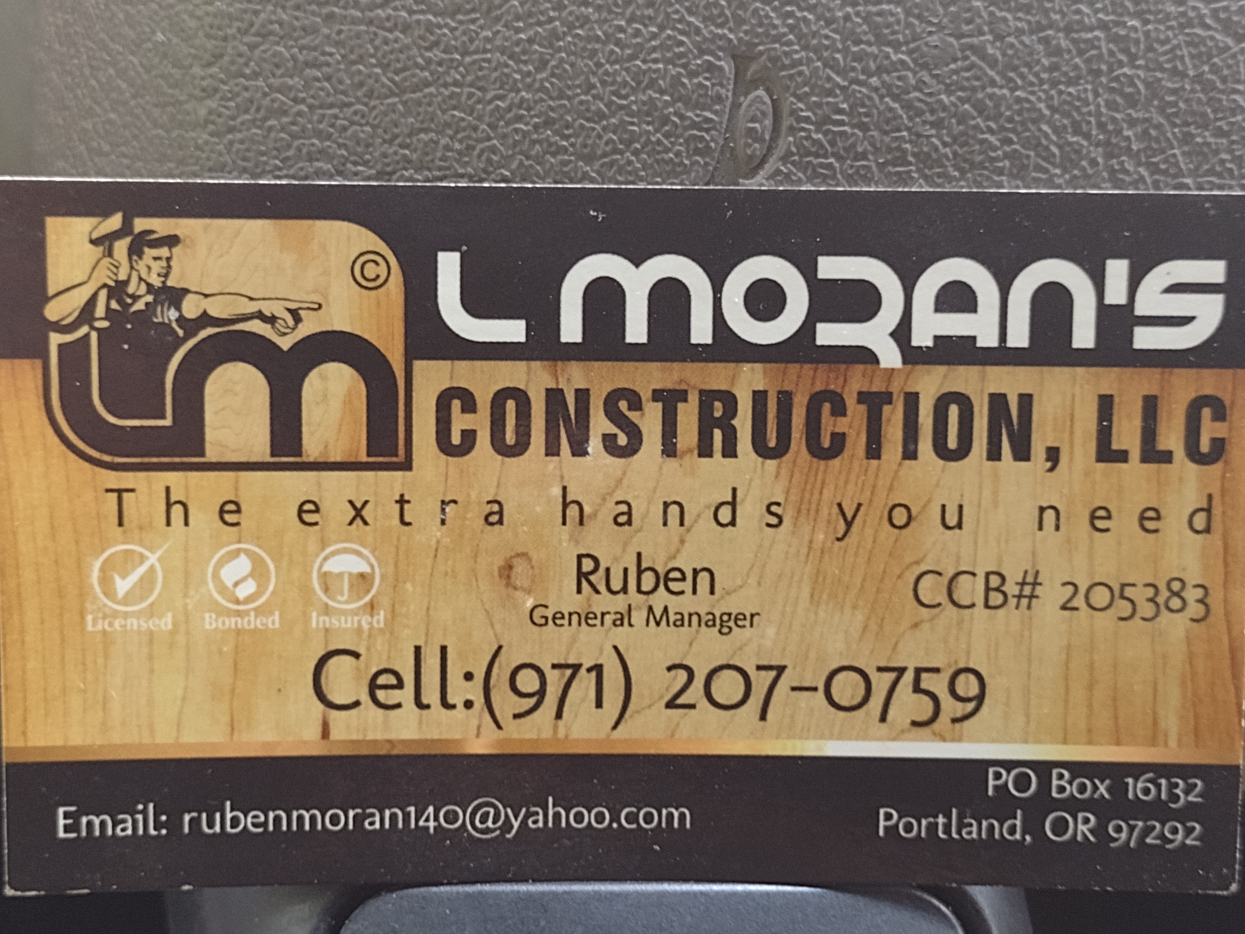 Laura Morans Construction, LLC Logo