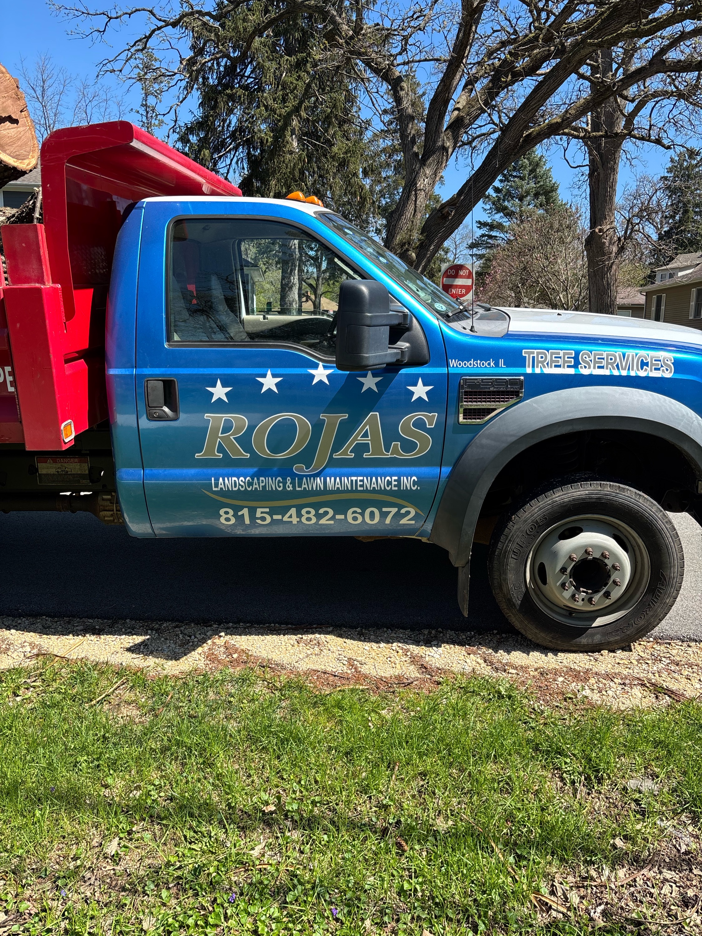 Rojas Landscaping and Lawn Maintenance Logo